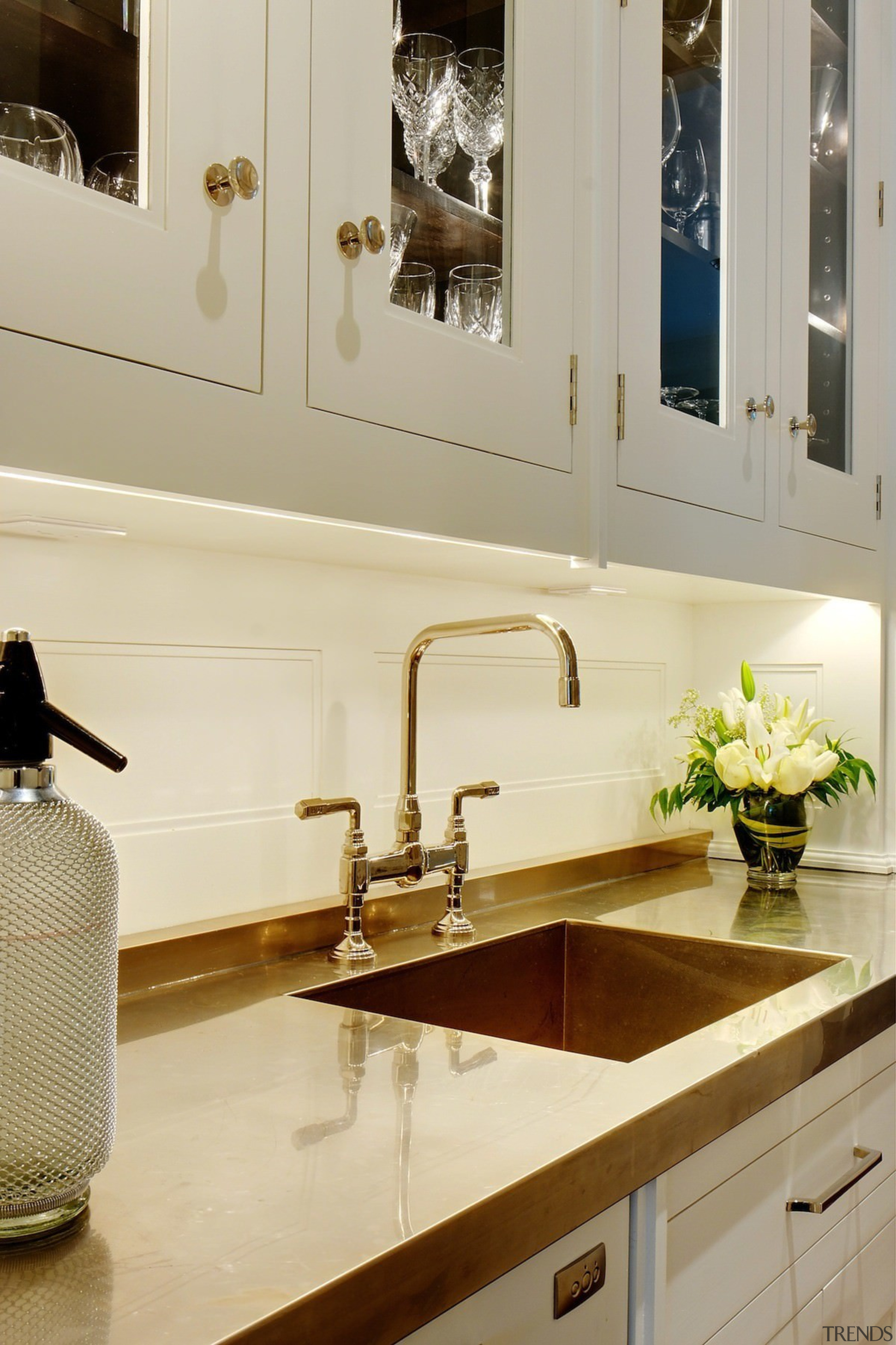 A polished countertop reflects the fittings and lights bathroom, countertop, interior design, kitchen, room, sink, tap, orange