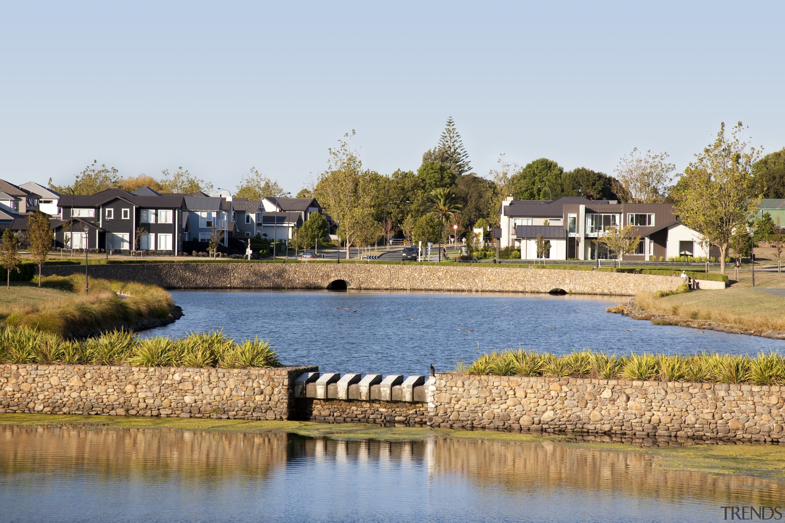 James Hardie Building Products used on House Karaka cottage, estate, home, house, lake, landscape, property, real estate, reflection, residential area, resort, sky, suburb, tree, villa, water, waterway, white