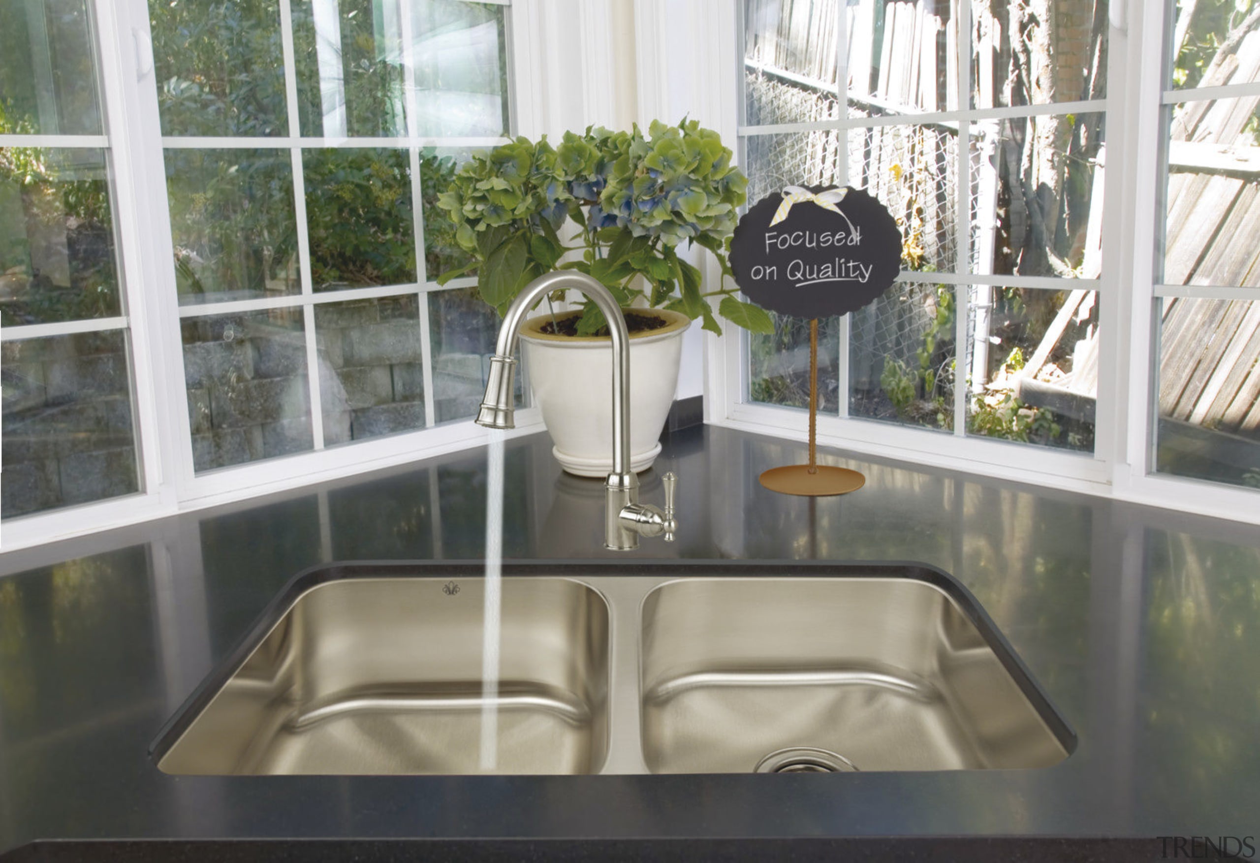 View of a kitchen which features a stainless home, interior design, property, window, gray, white