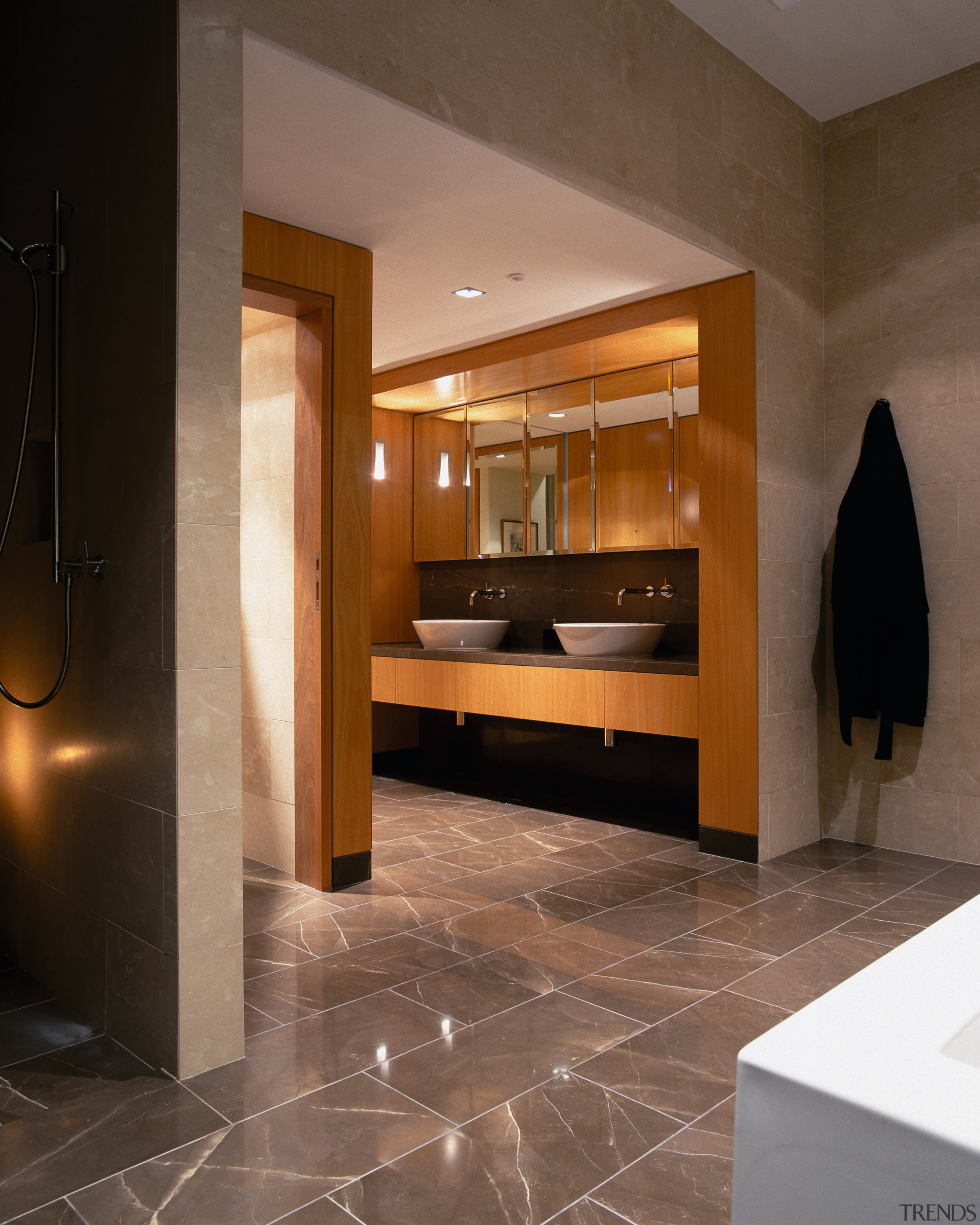 Image of the master ensuite which features marble bathroom, floor, flooring, interior design, lobby, room, tile, brown