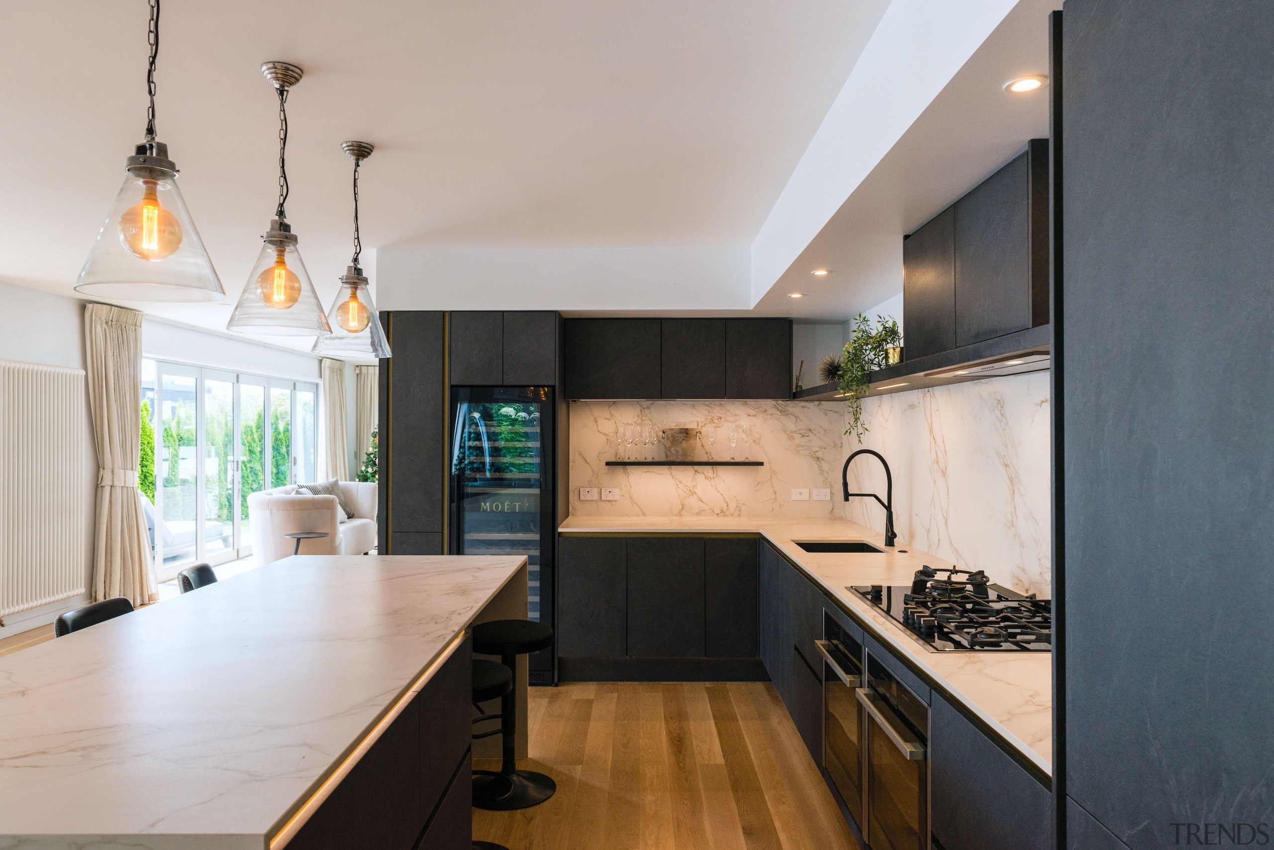The kitchen boasts an L-shaped perimeter workspace. 