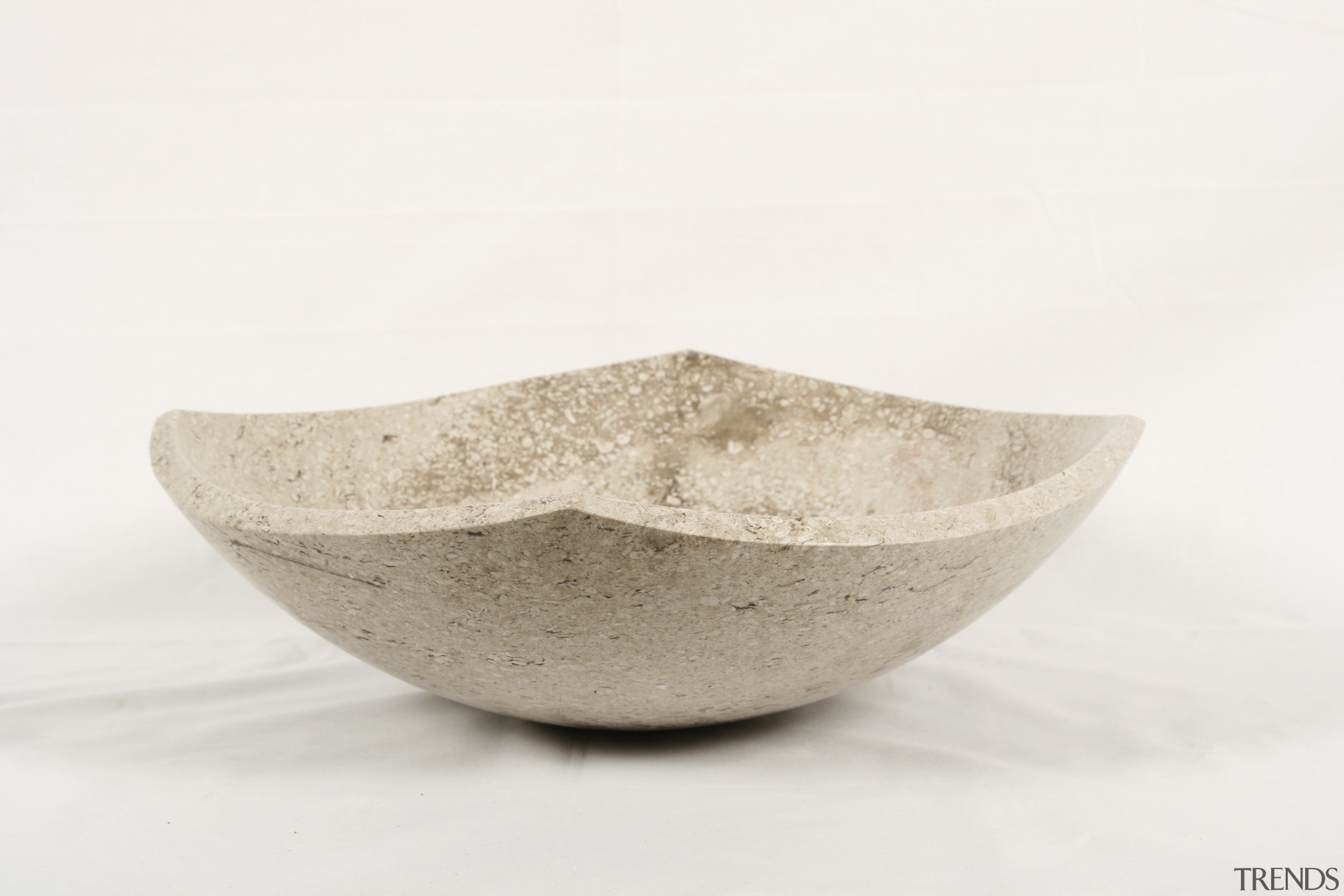 View of custom-designed stone vessel sinks crafted from bowl, ceramic, product design, tableware, white