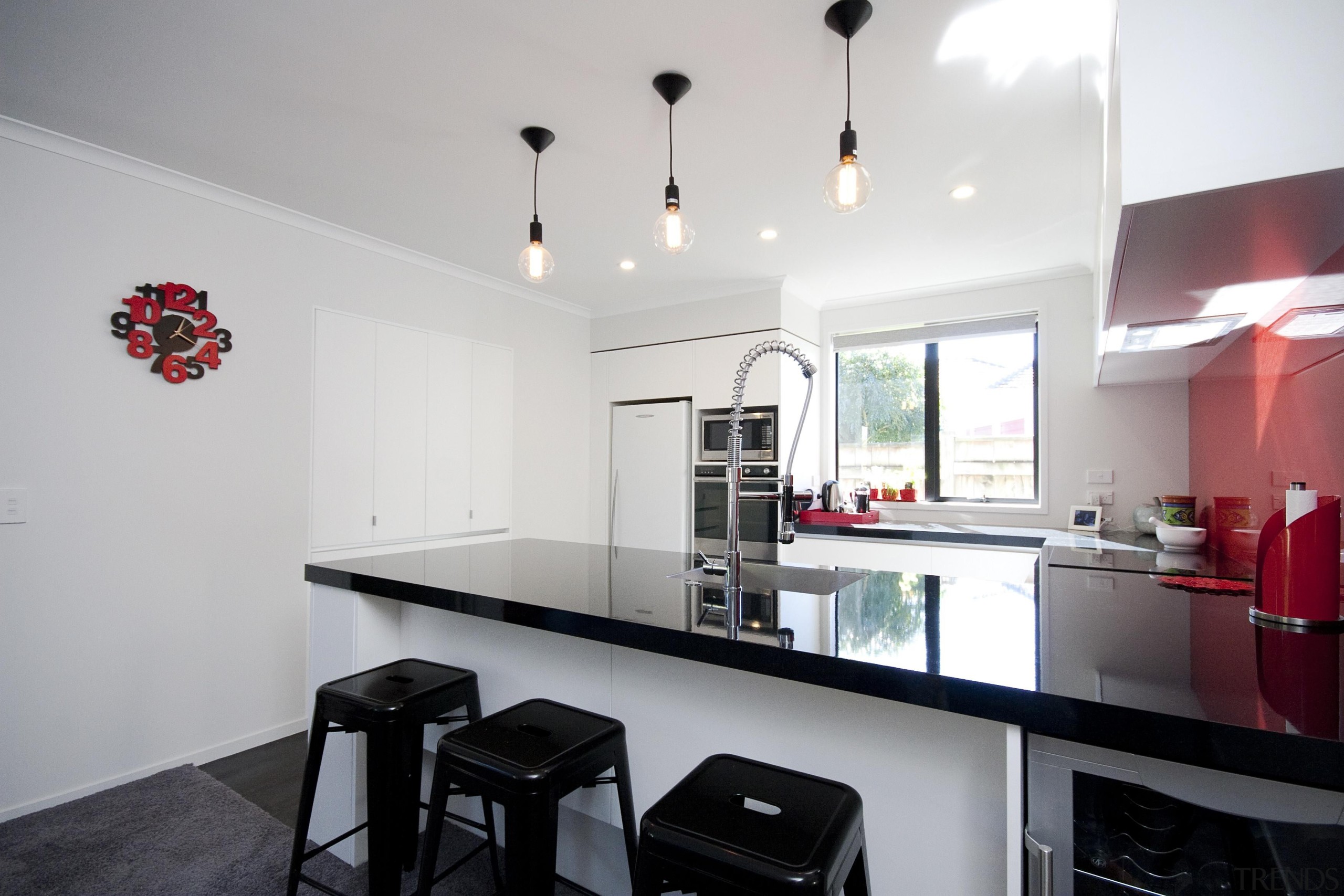 This town house built by Fowler Homes Taranaki apartment, countertop, home, interior design, kitchen, property, real estate, room, gray, white