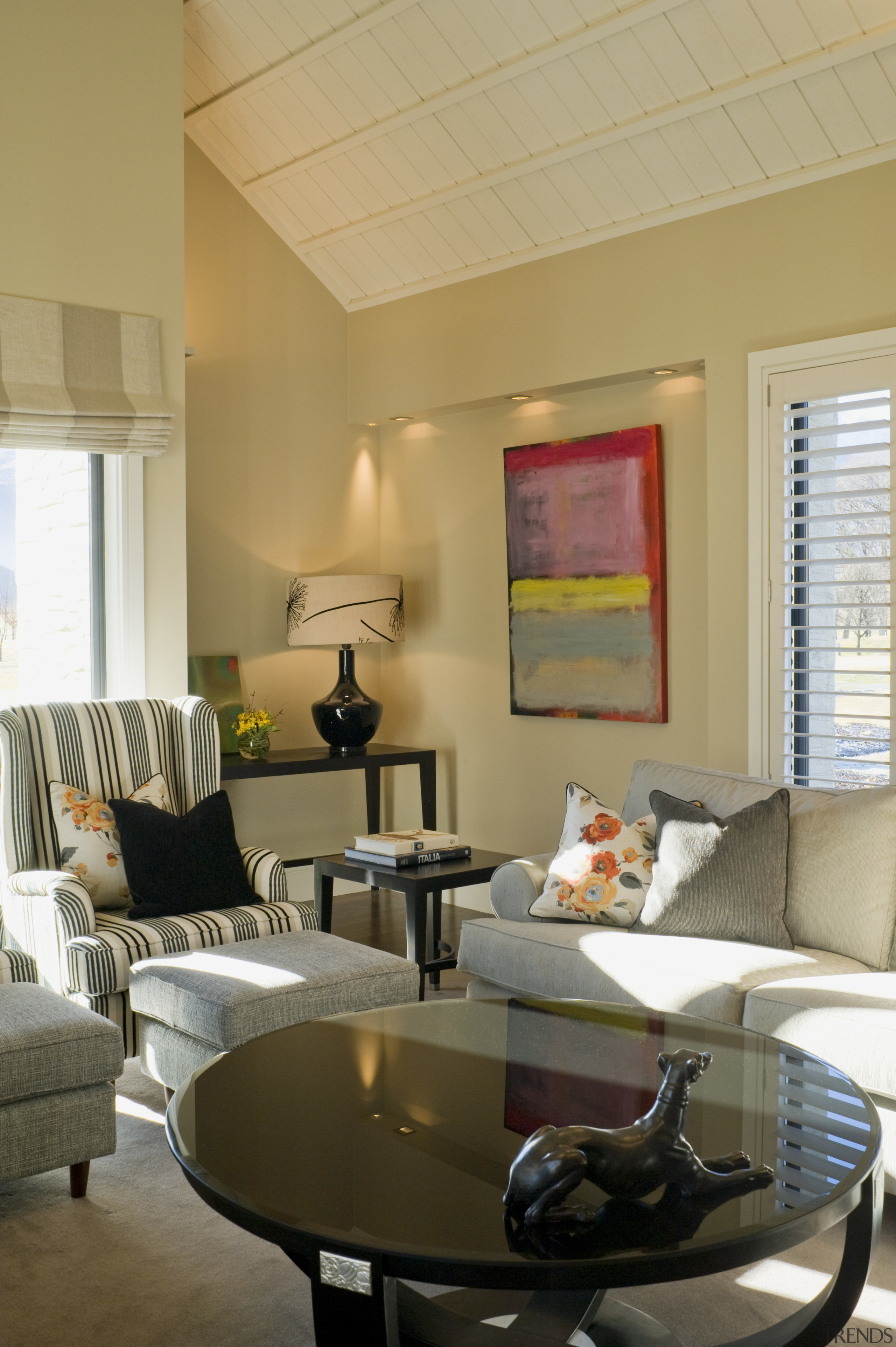 The interior style is a combination of modern ceiling, home, interior design, living room, real estate, room, table, window, orange, brown