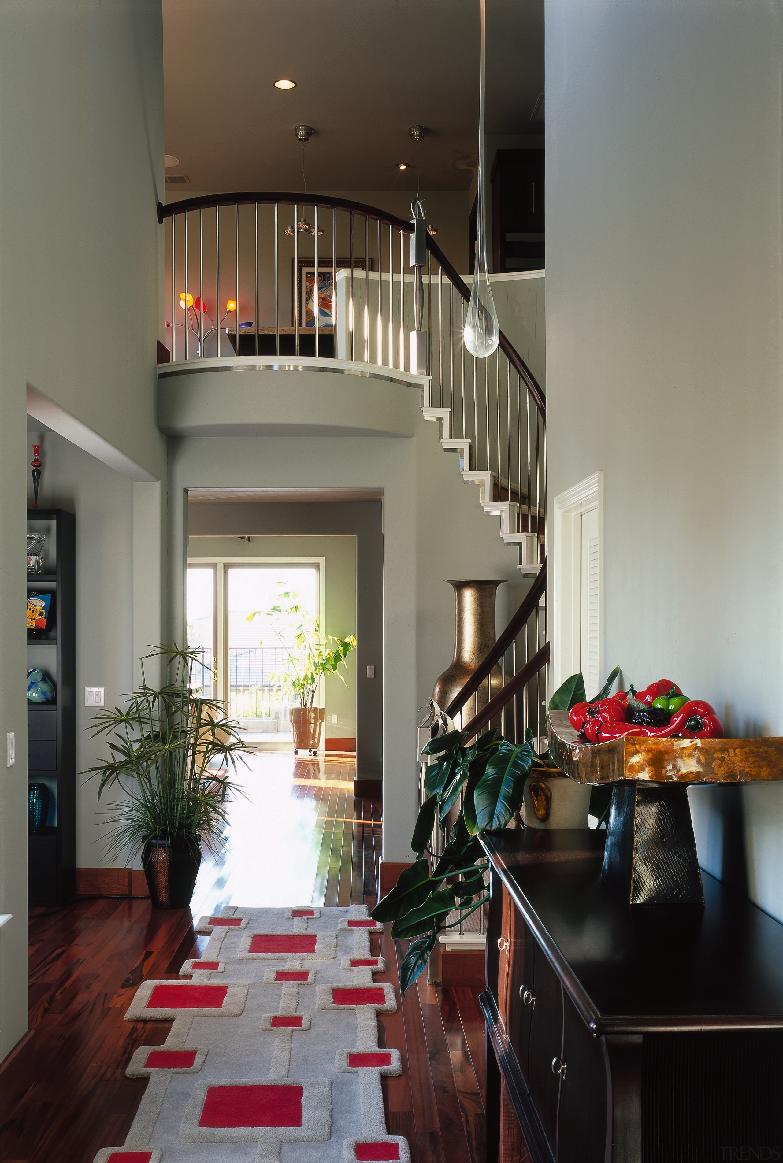 view of the entrance are featuring timberflooring and architecture, ceiling, dining room, home, house, interior design, living room, lobby, room, stairs, table, gray, black