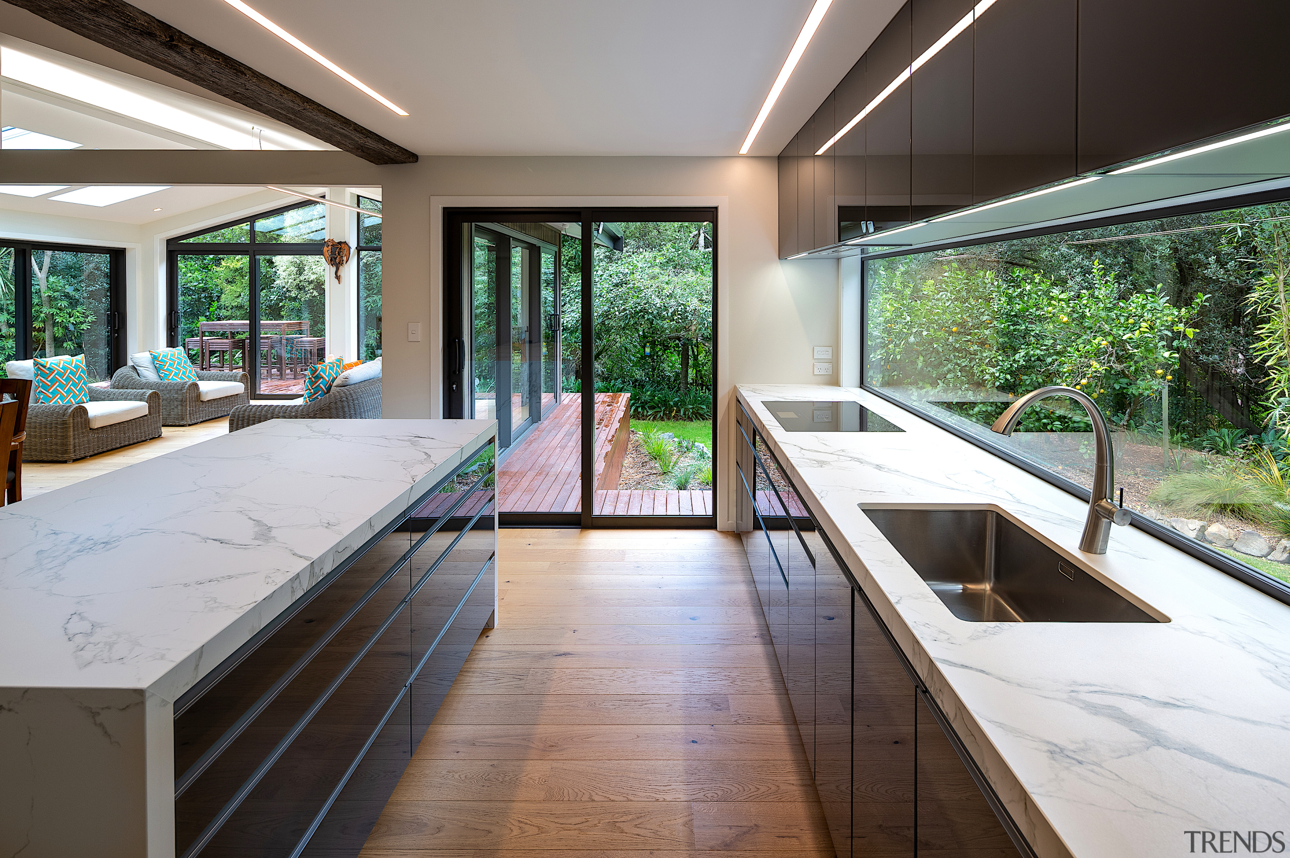 Recessed pulls on the cabinetry optimise ease of 