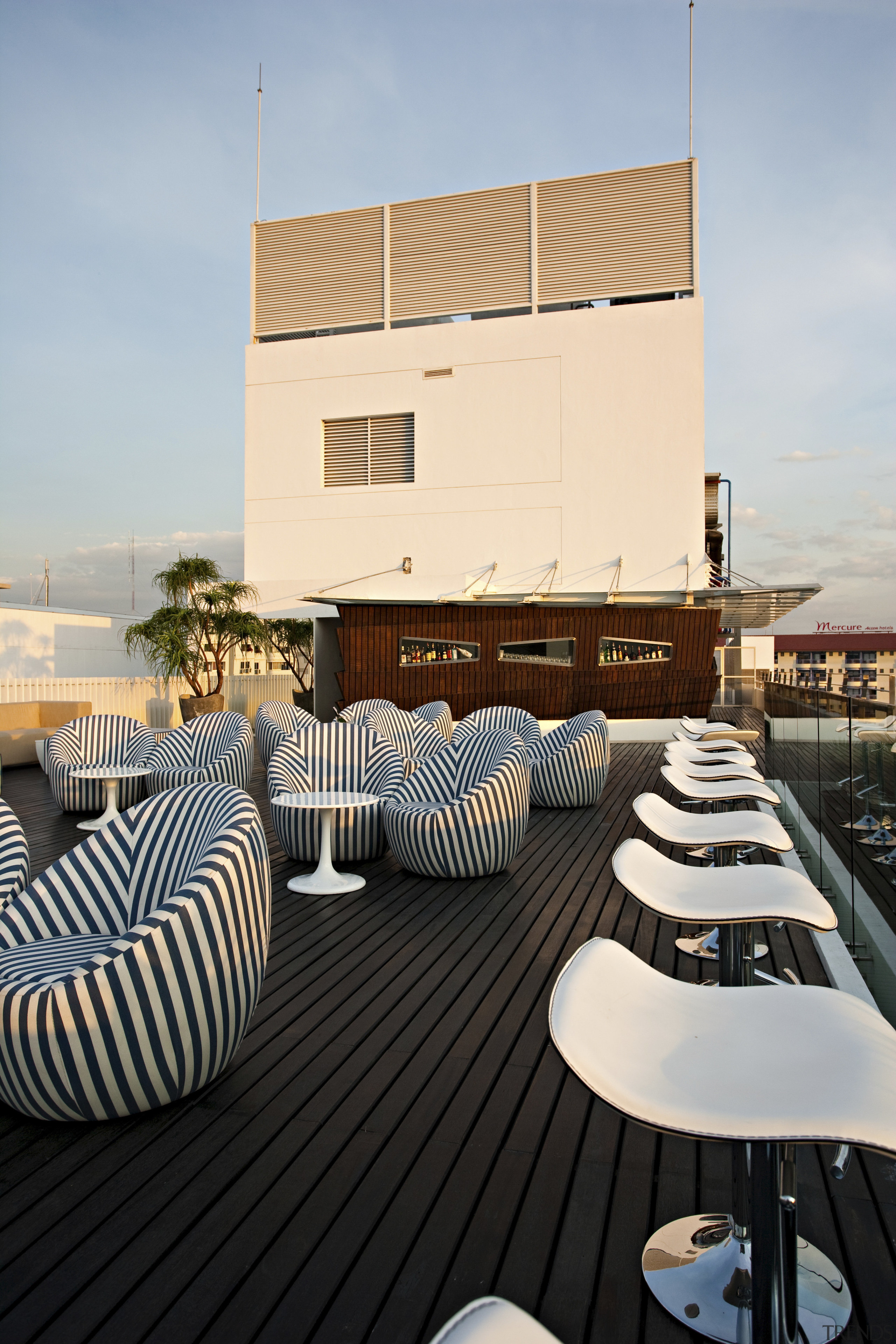 View of rooftop lounge and bar area. - apartment, architecture, balcony, home, house, real estate, roof, gray, black
