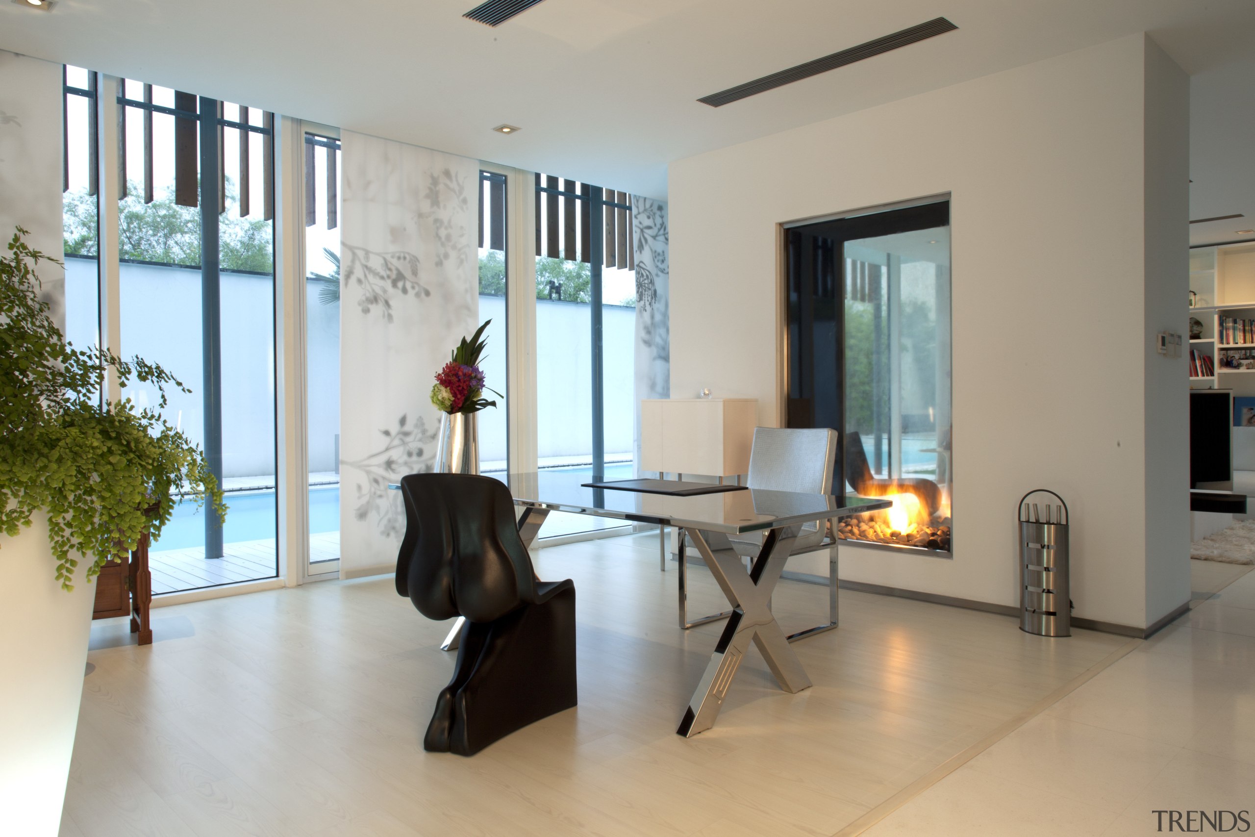 View of informal dining area with glass topped floor, flooring, interior design, living room, lobby, real estate, room, gray