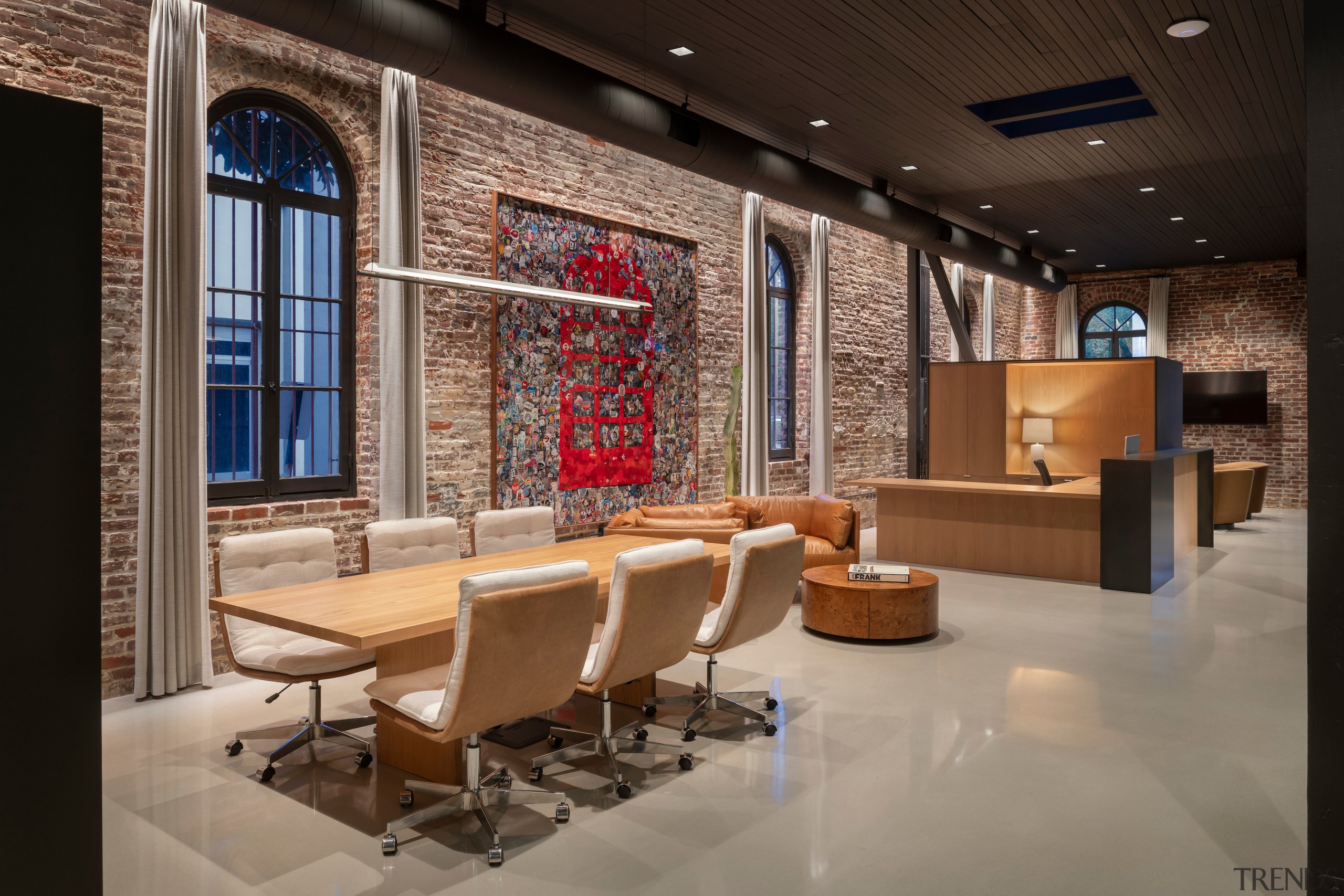 Standing millwork storage modules subdivide the open area 