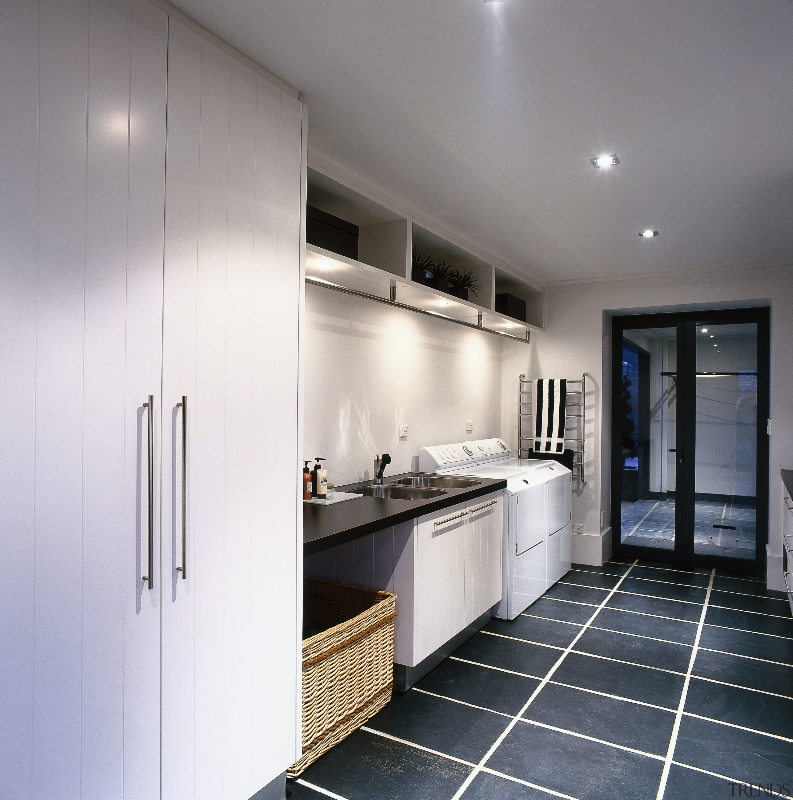 view of this laundry that doubles as a cabinetry, countertop, interior design, kitchen, real estate, room, gray, white