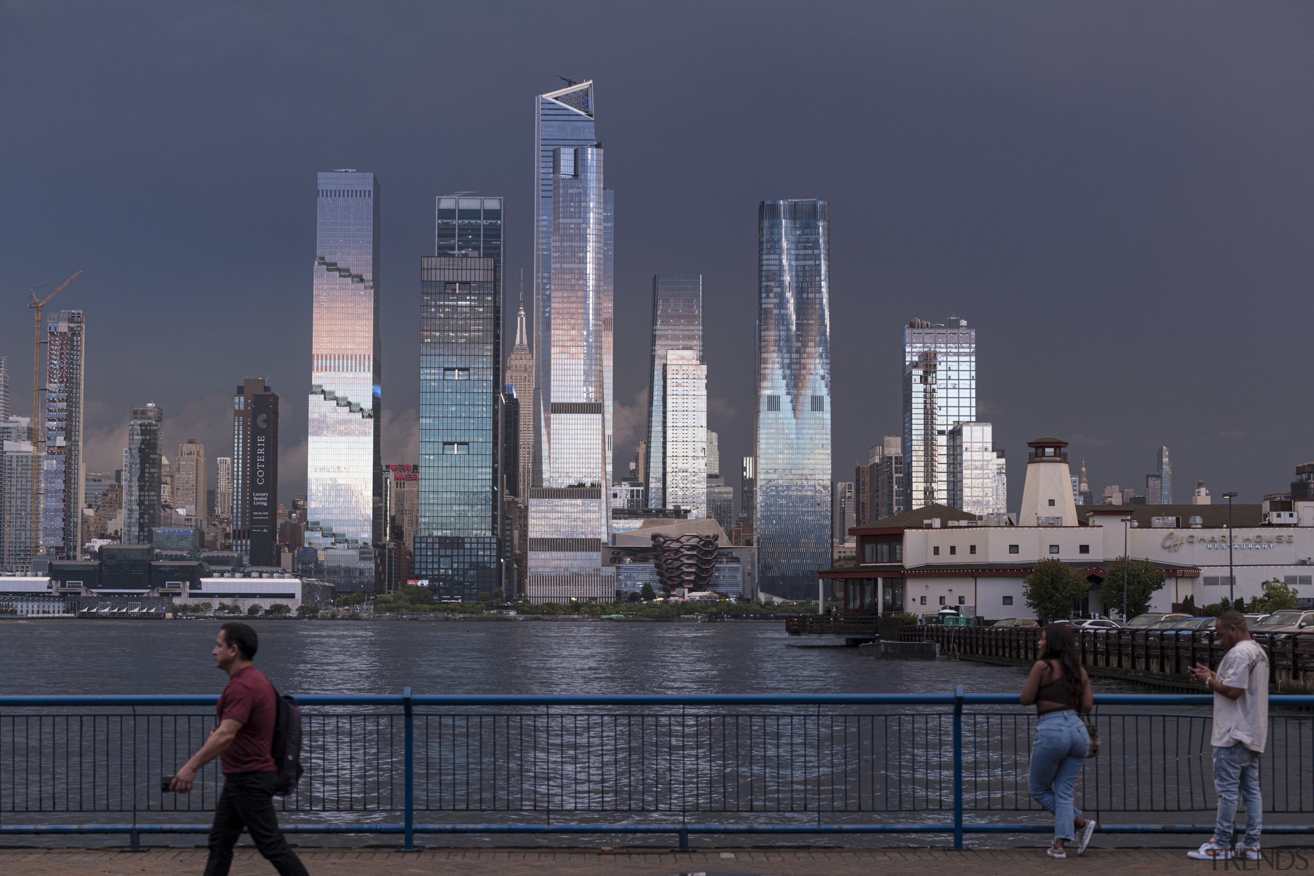 Evening light catches the reflective facade. 