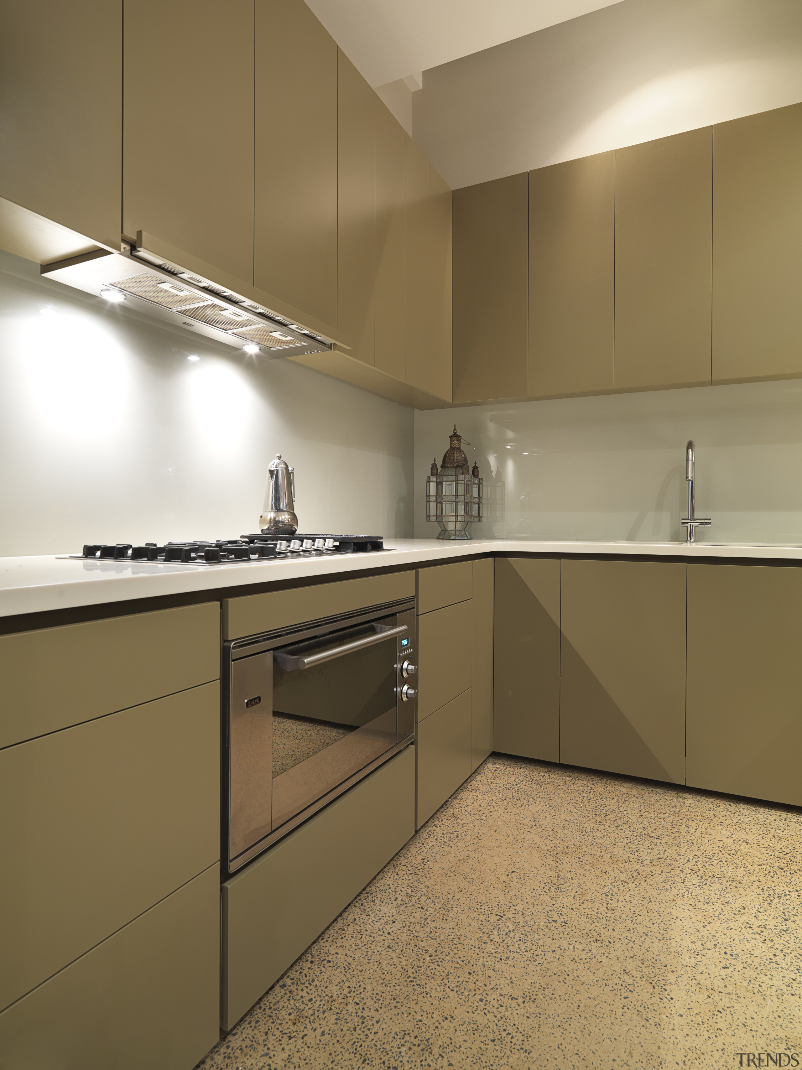 View of kitchen which features, polished concrete floors, cabinetry, countertop, floor, interior design, kitchen, property, real estate, room, sink, under cabinet lighting, brown