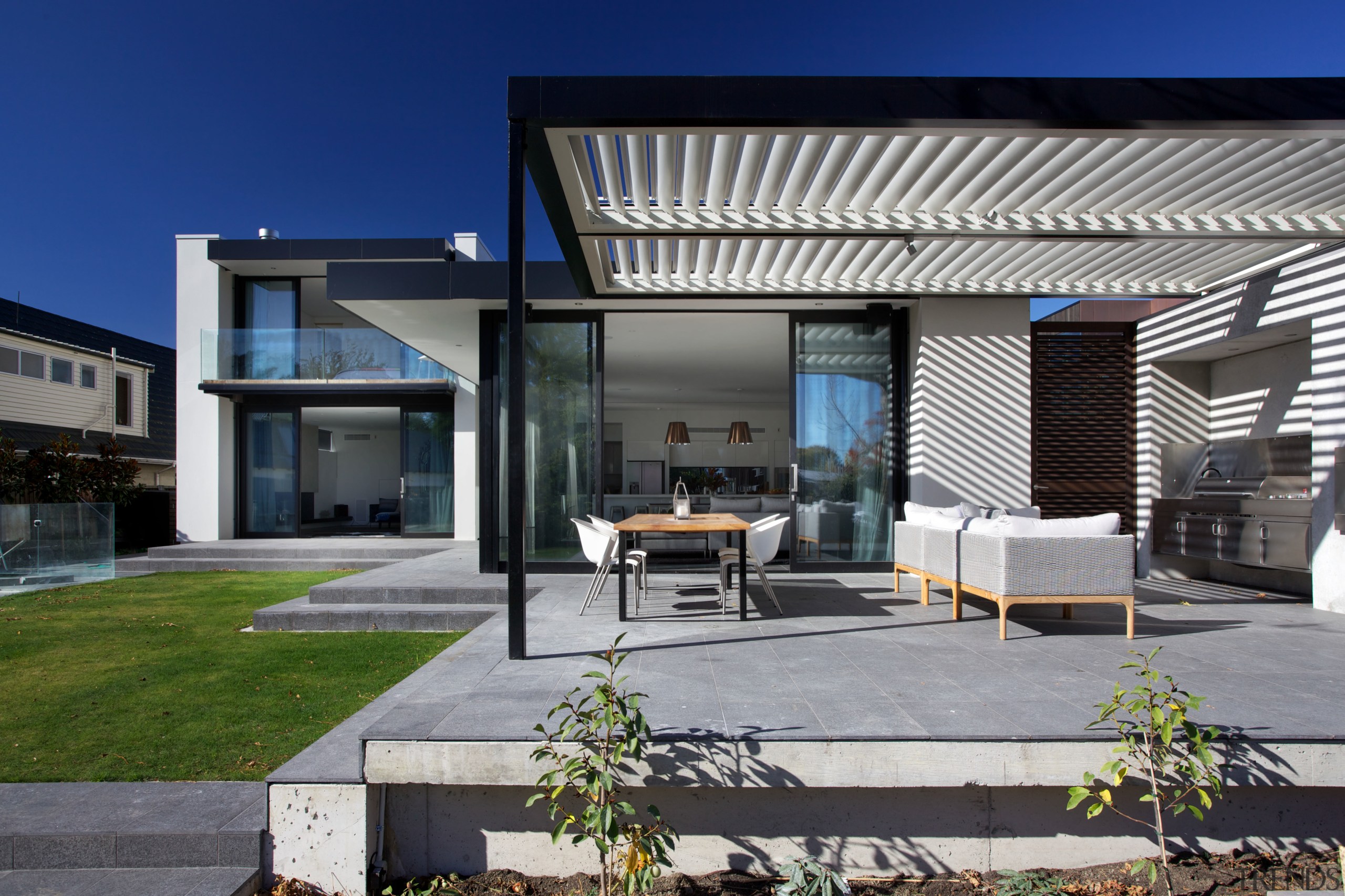 Basalt pavers with a flamed finish provide a architecture, elevation, facade, home, house, property, real estate, residential area, gray, black