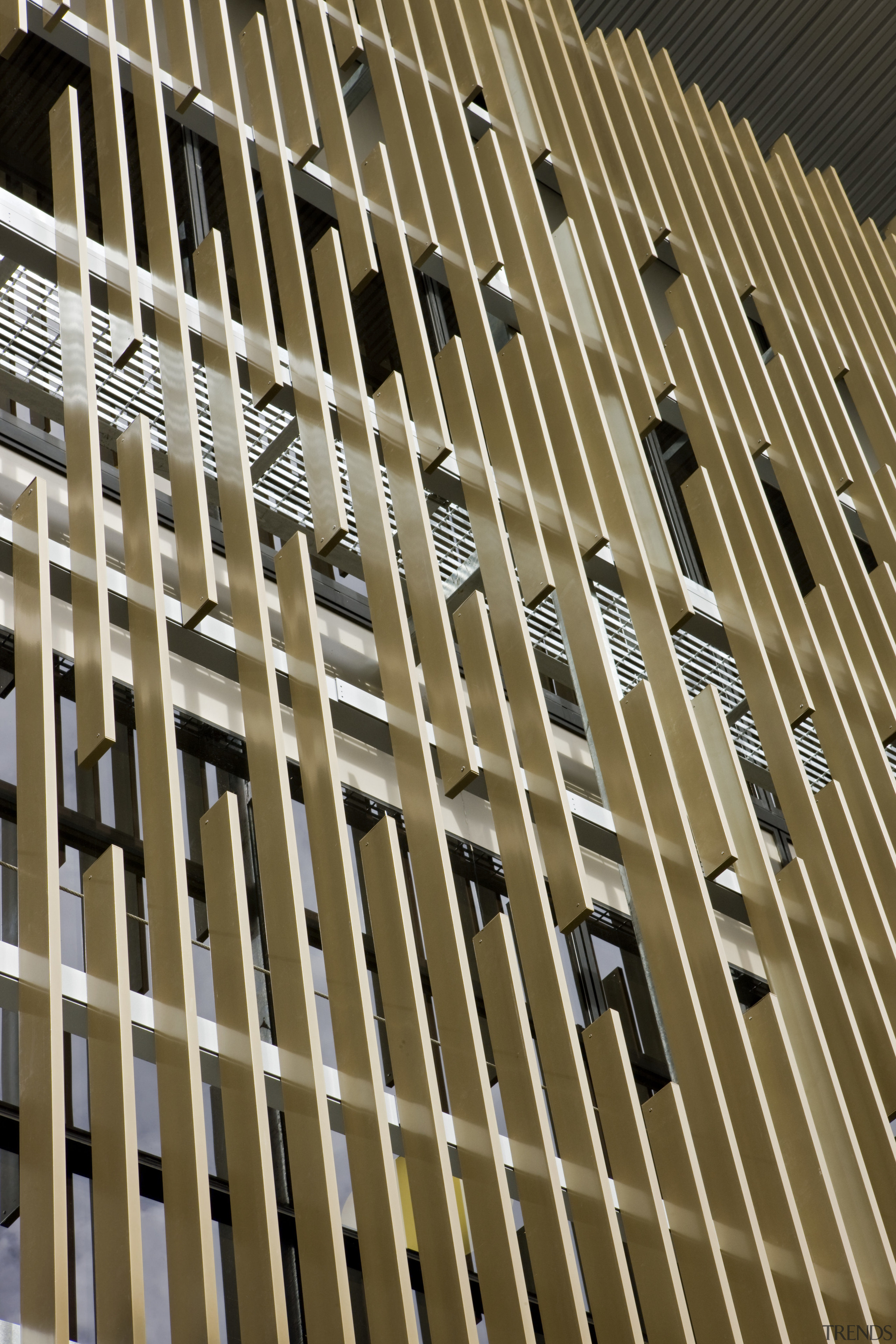 Timber sunshades on the building exterior create dappled architecture, building, facade, line, material, structure, wood, brown