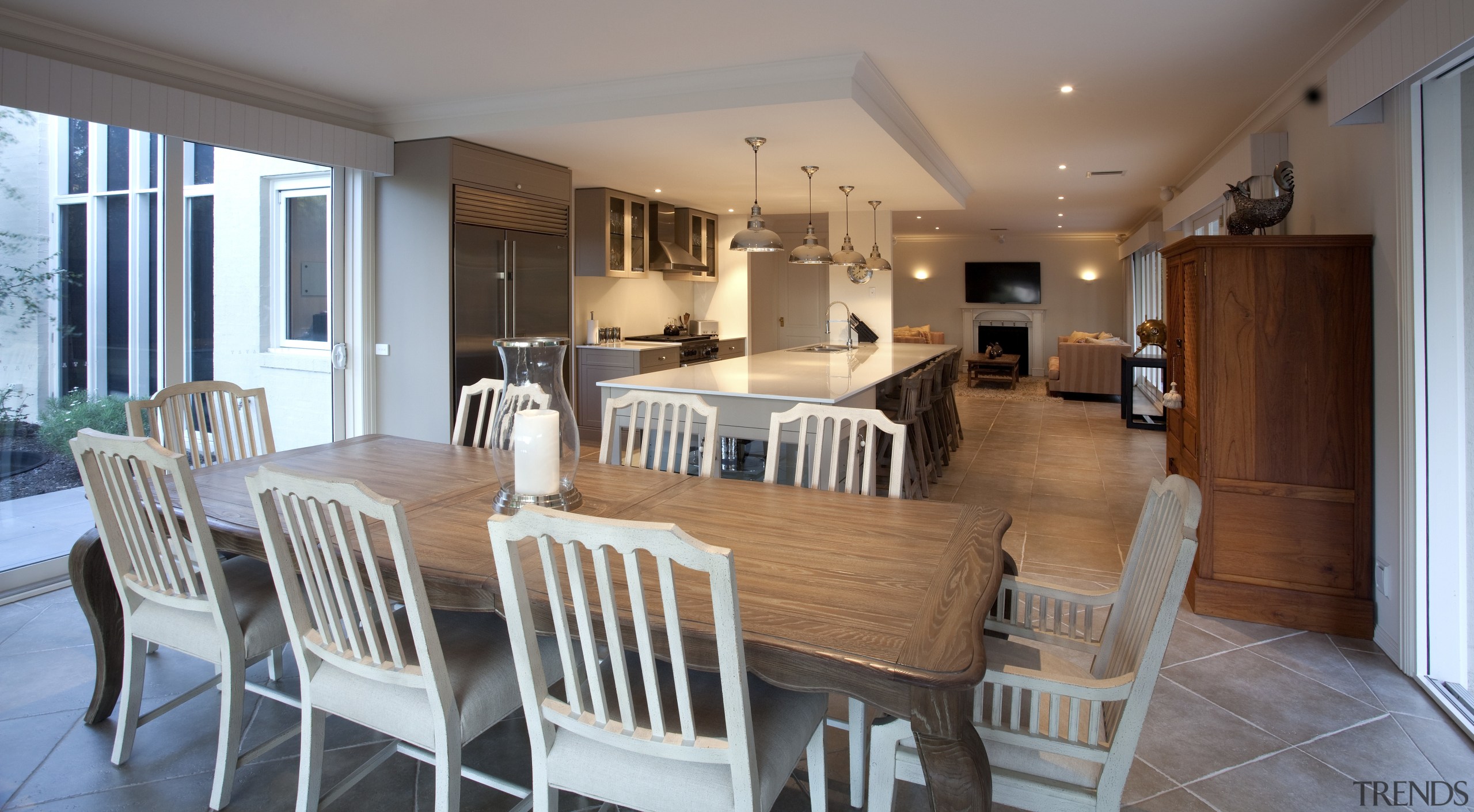 A new entertainers kitchen connects existing and remodelled dining room, estate, floor, flooring, home, interior design, living room, property, real estate, room, table, gray