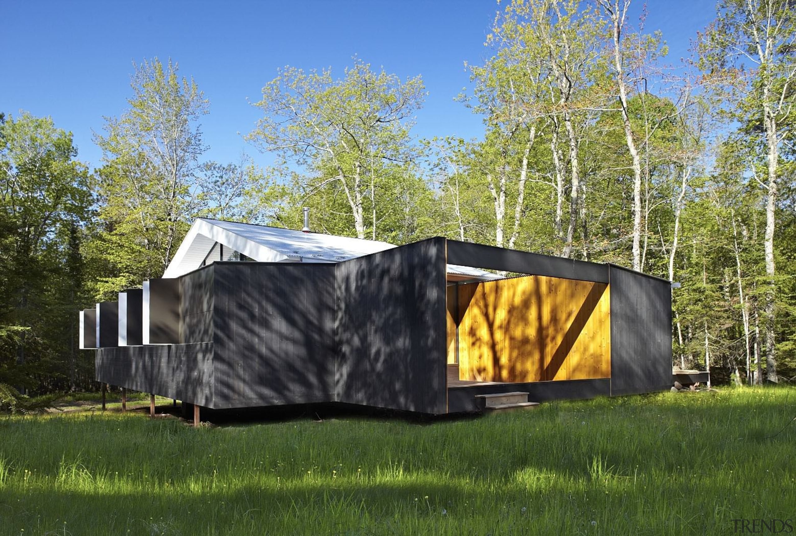 Step up into the outdoor room before entering camping, canopy, grass, home, house, real estate, rural area, shack, shed, tarpaulin, tent, brown