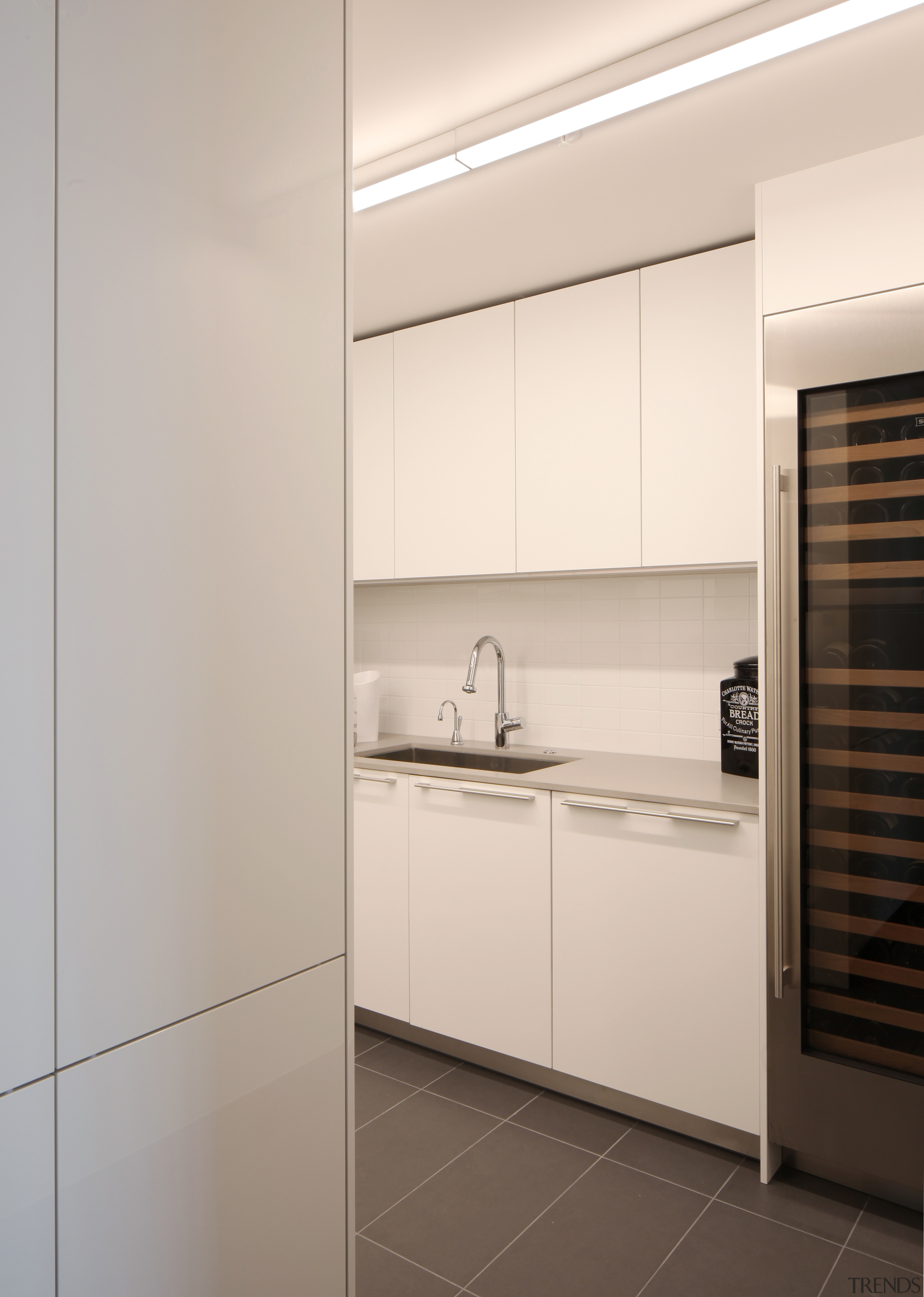 ​​​​​​​In this apartment, the well-set-up kitchen is served cabinetry, countertop, home appliances, Apartment, kitchen, appliances, Baulthaup, Sub Zero, William Landeros,  Kitchen Distributors