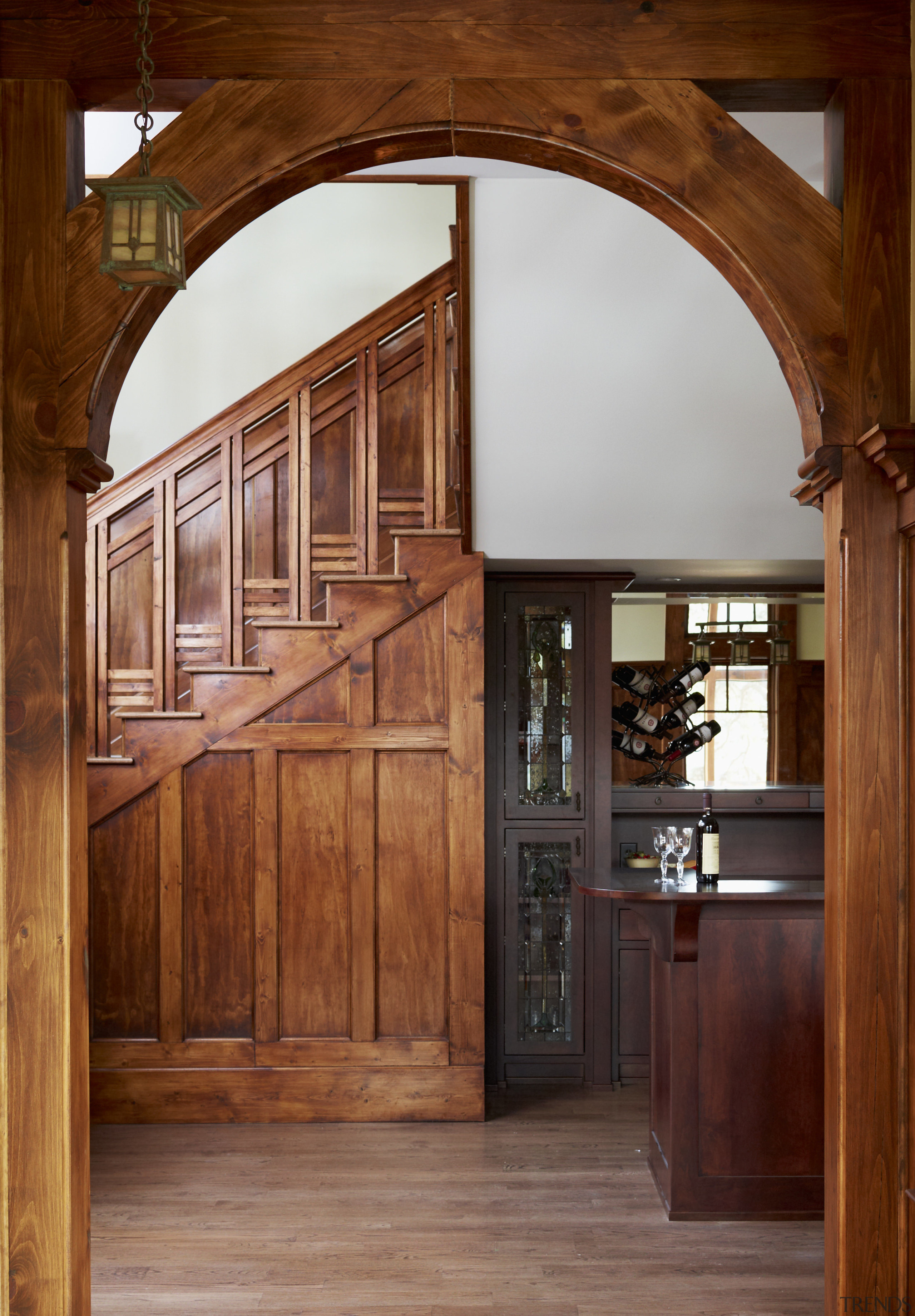 Fine craftsmanship is a hallmark of the Arts arch, door, hardwood, wall, window, wood, wood stain, brown, red