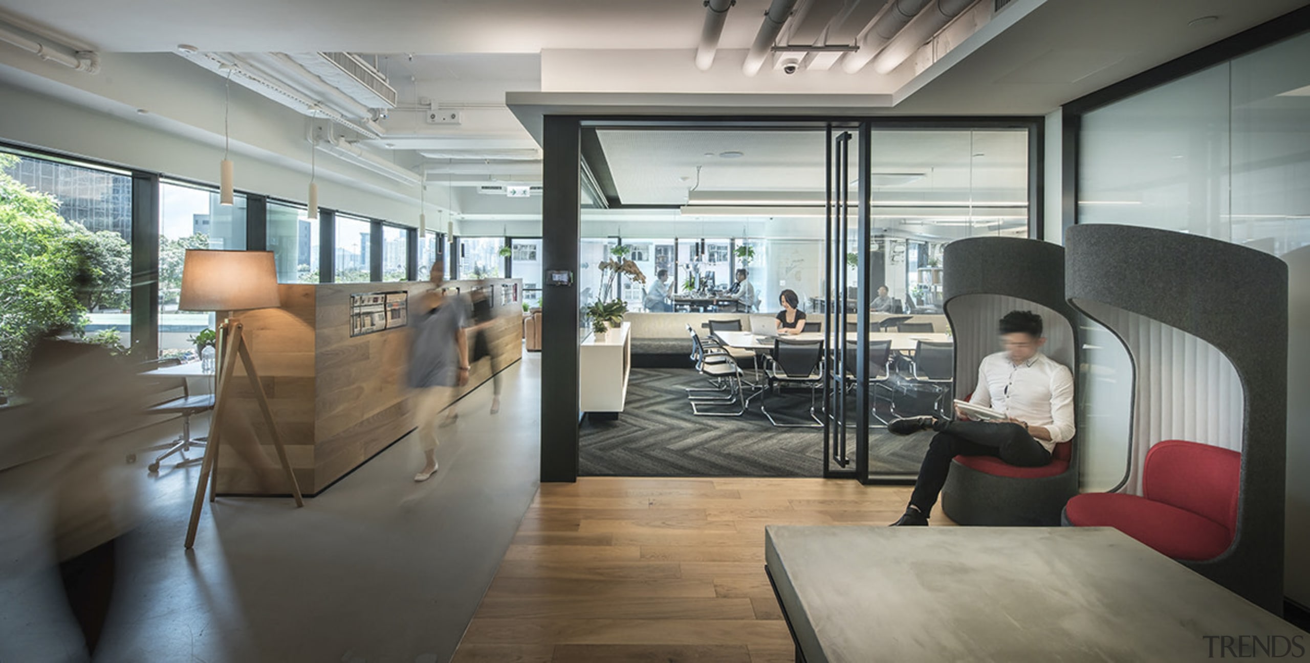 Recycled and custom furniture pieces are seen throughout interior design, gray