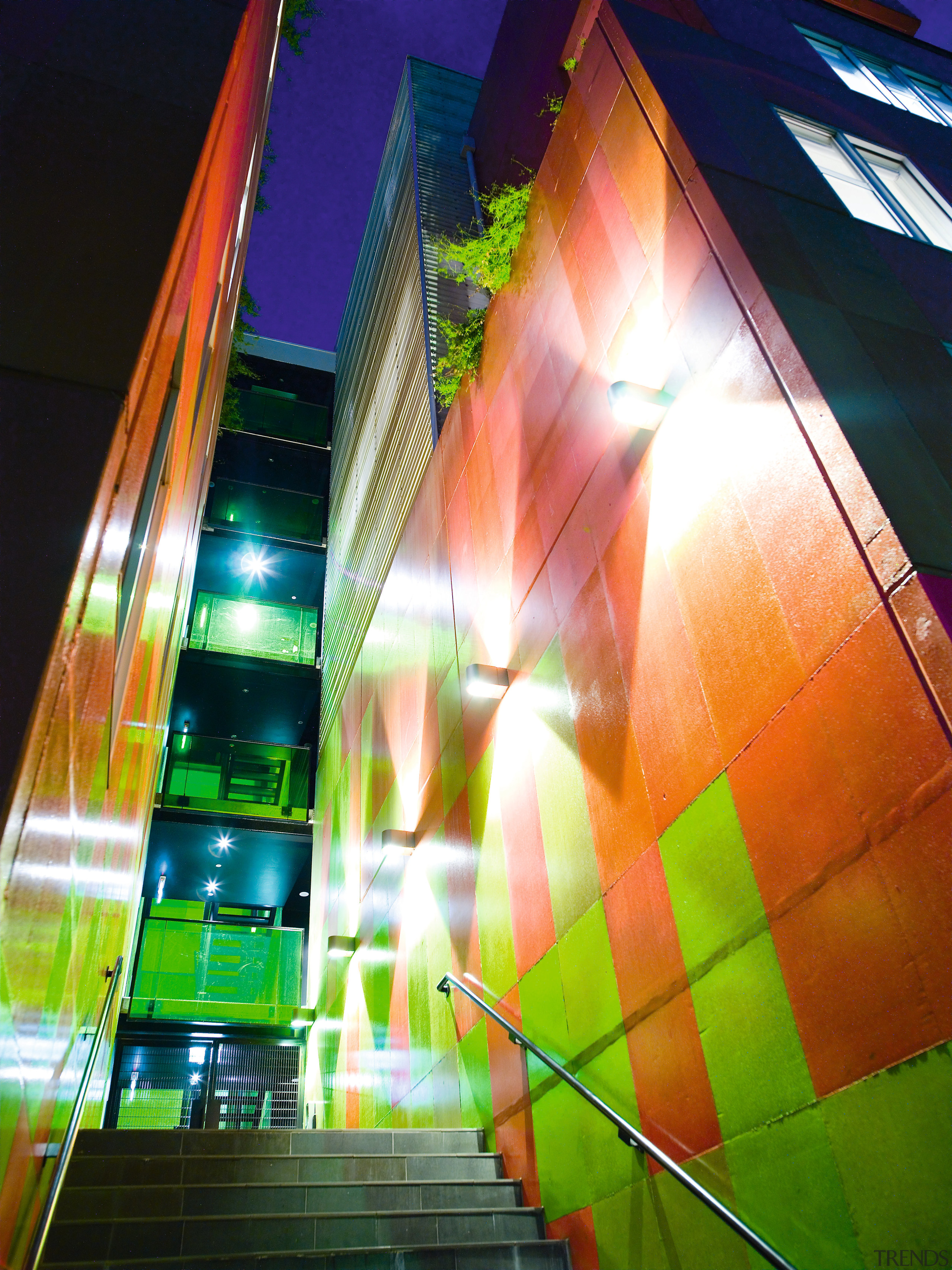 A view of this urban residential building implemented architecture, daylighting, green, light, lighting, line, metropolitan area, night, reflection, structure, urban area, yellow