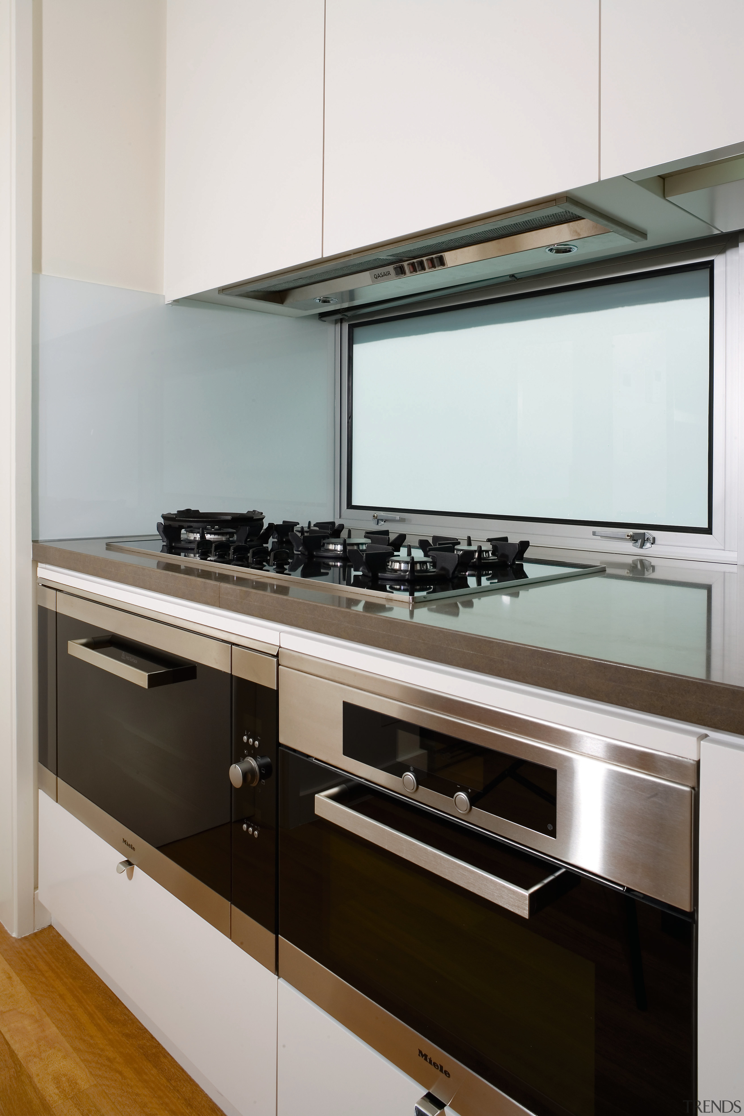 A view of some kitchen appliances from Miele. cabinetry, countertop, interior design, kitchen, kitchen stove, product design, room, white