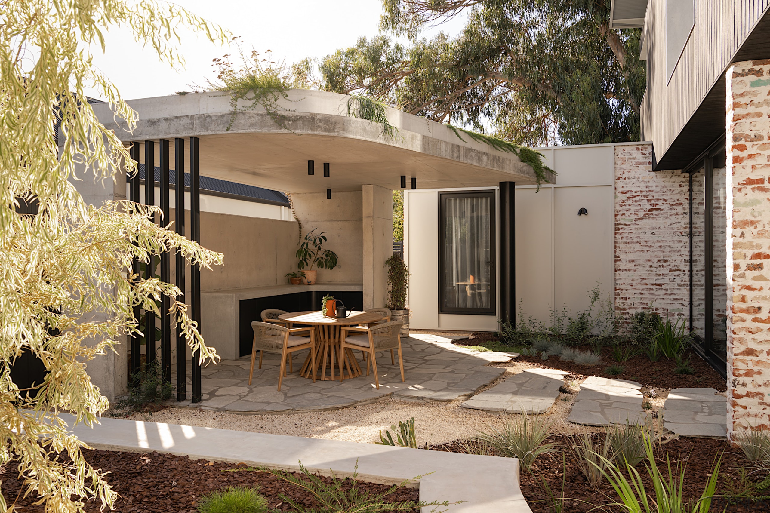The home's central, north-facing courtyard with alfresco covered 