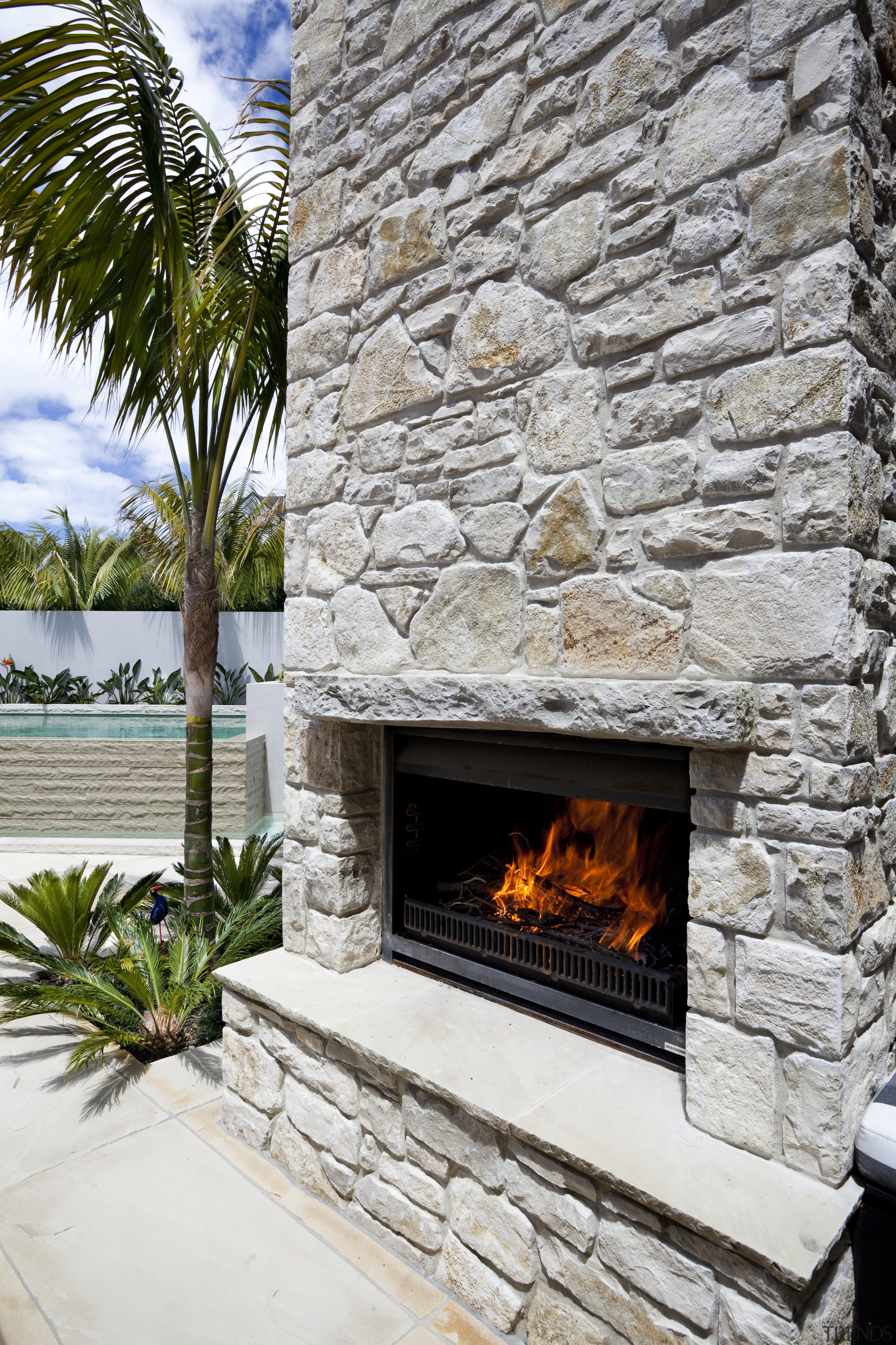 Outdoor fires from Fires By Design include the fireplace, hearth, heat, gray, white