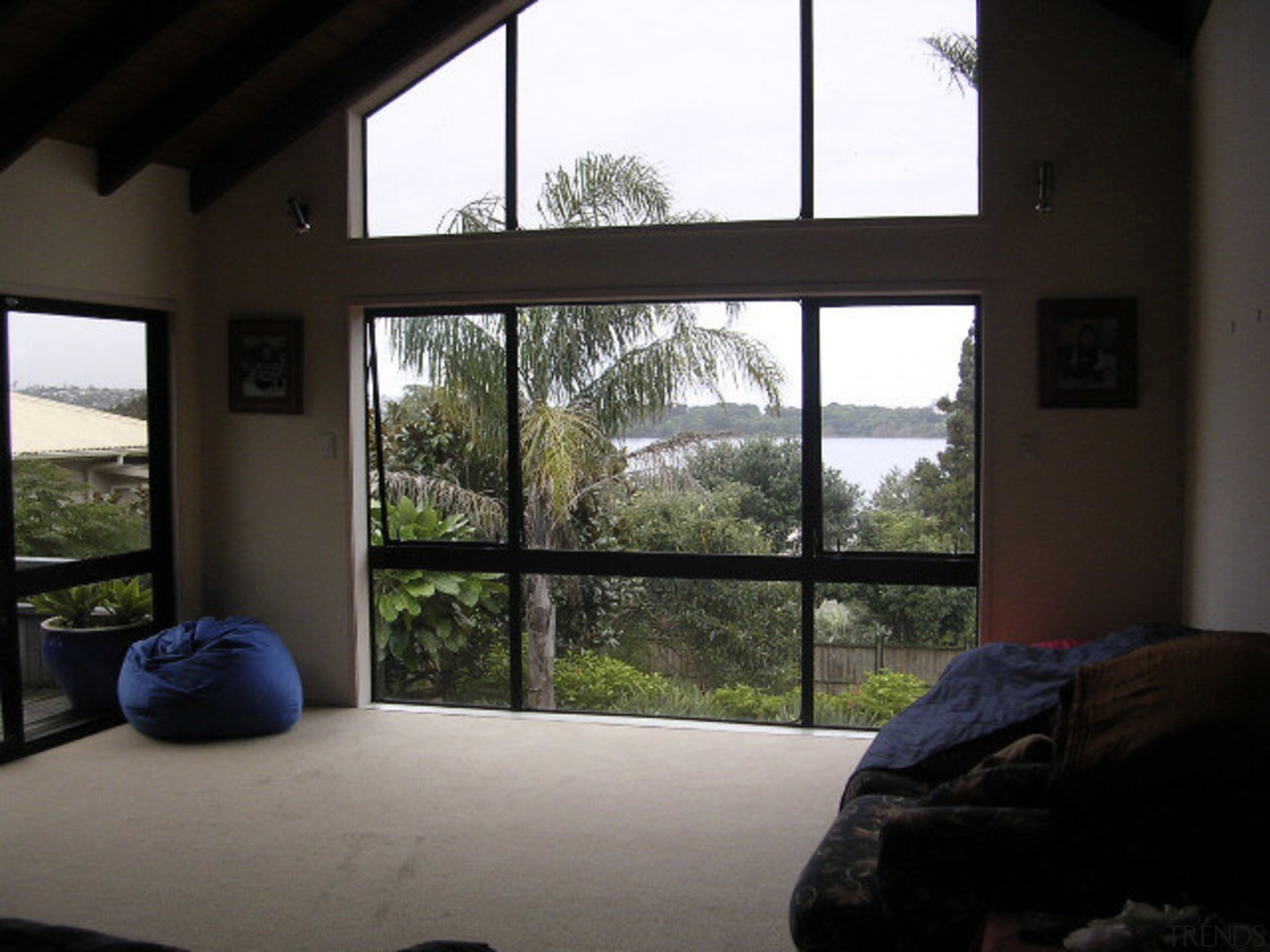 View of a living space with bean bags architecture, daylighting, door, estate, home, house, interior design, property, real estate, room, window, black