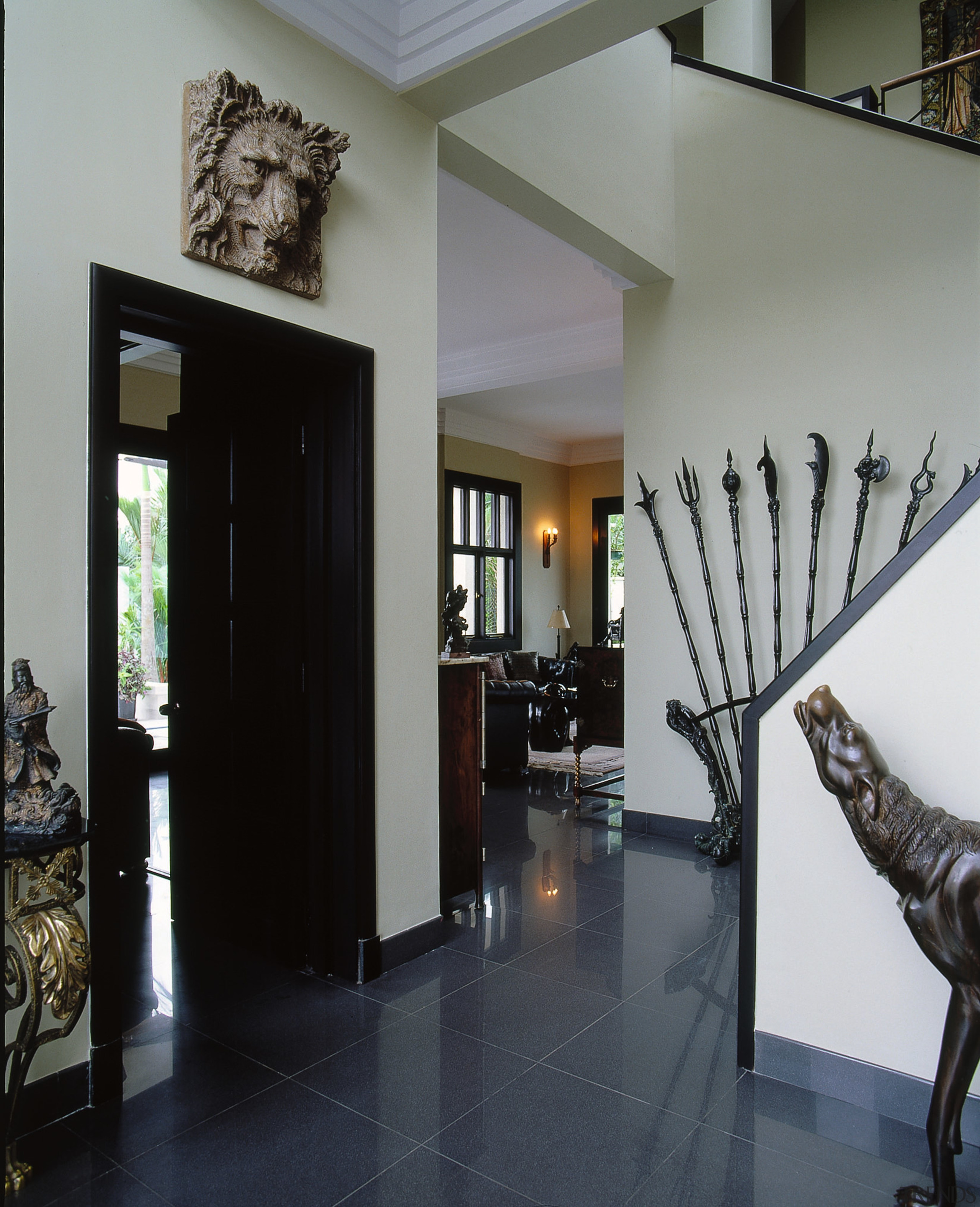 Close up view of the entrance way to ceiling, floor, flooring, interior design, lobby, property, stairs, gray, black