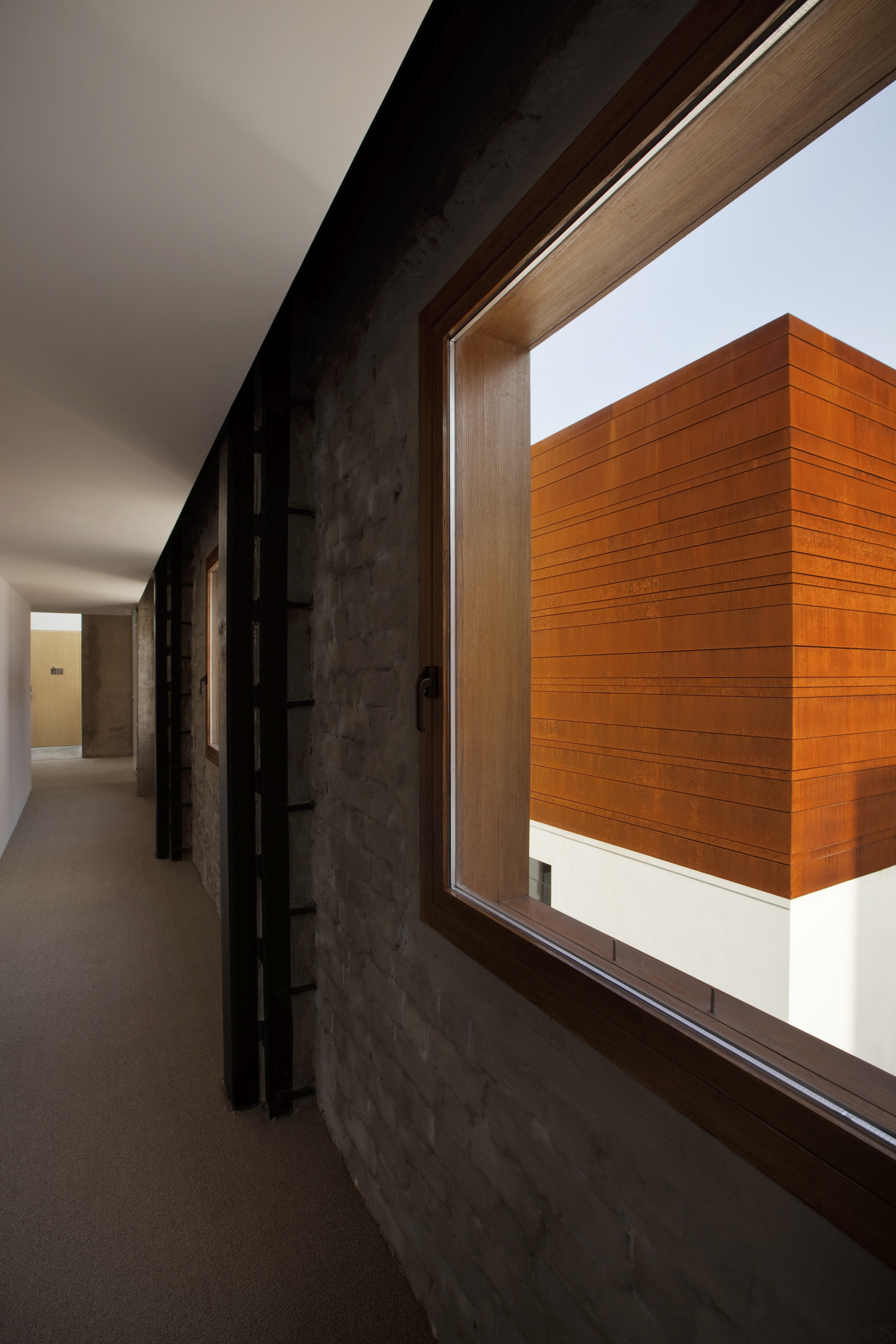 View of a contemporary boutique hotel in Shanghai. architecture, ceiling, daylighting, floor, home, house, interior design, wall, window, wood, black, brown