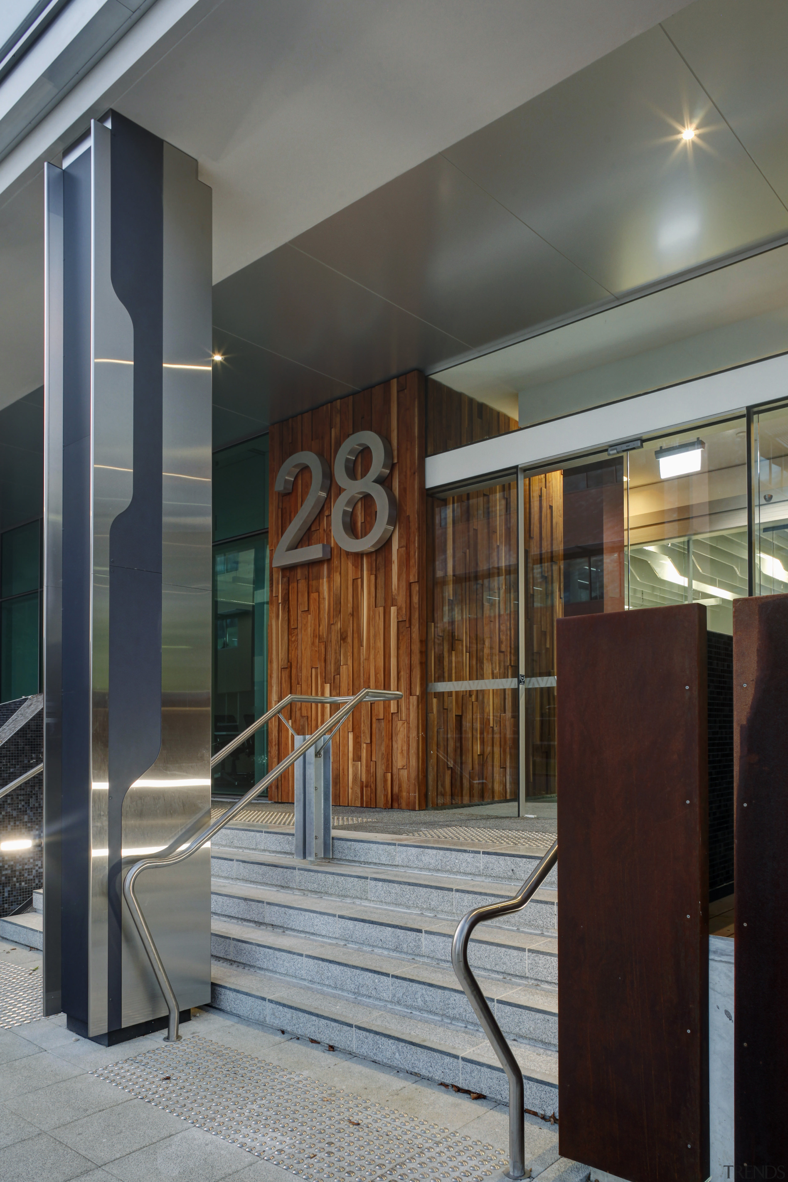 This boutique office development on a brownfields site architecture, ceiling, door, glass, interior design, lobby, gray