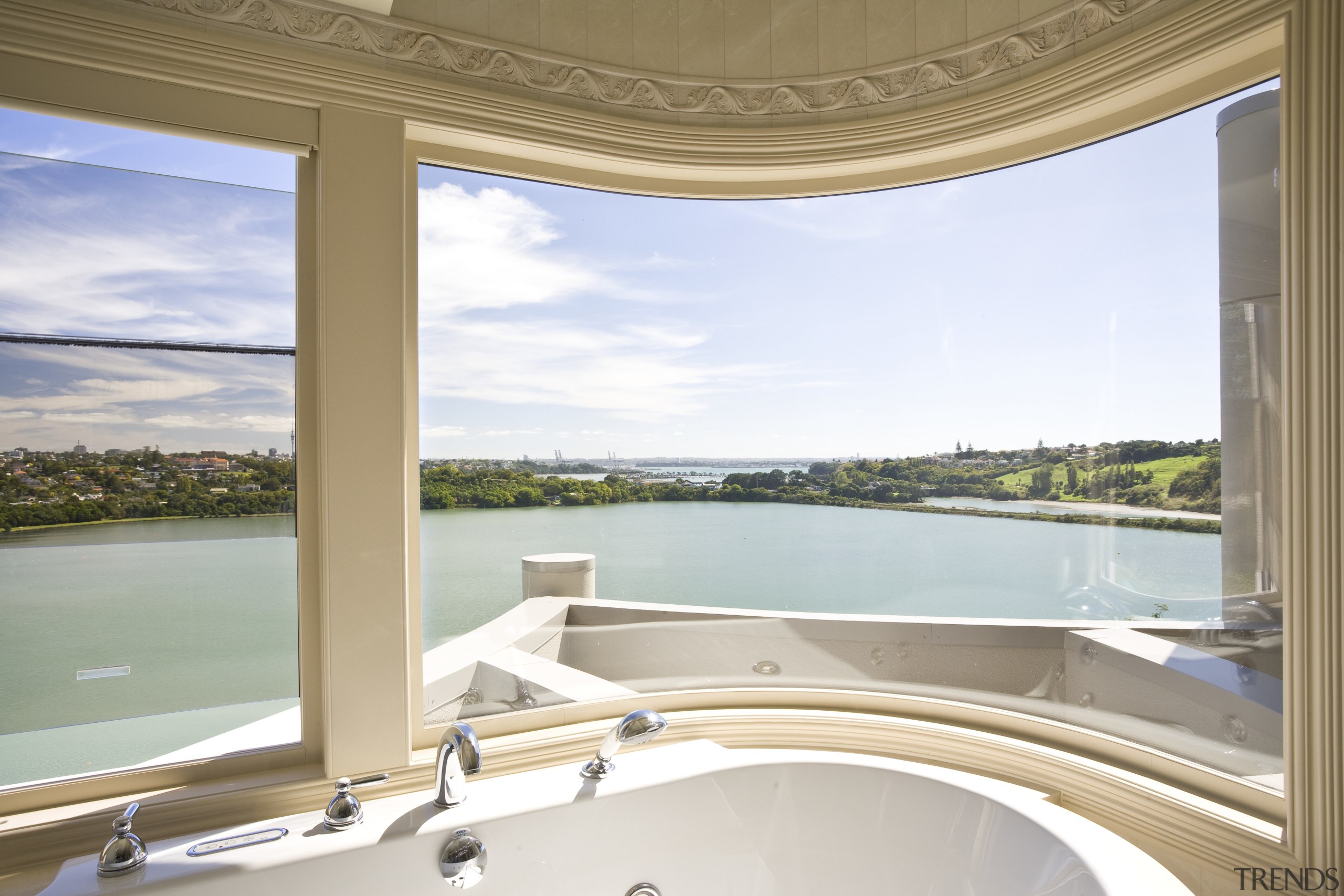 View of a curved bathroom window which was apartment, architecture, daylighting, estate, interior design, property, real estate, sky, water, window, white