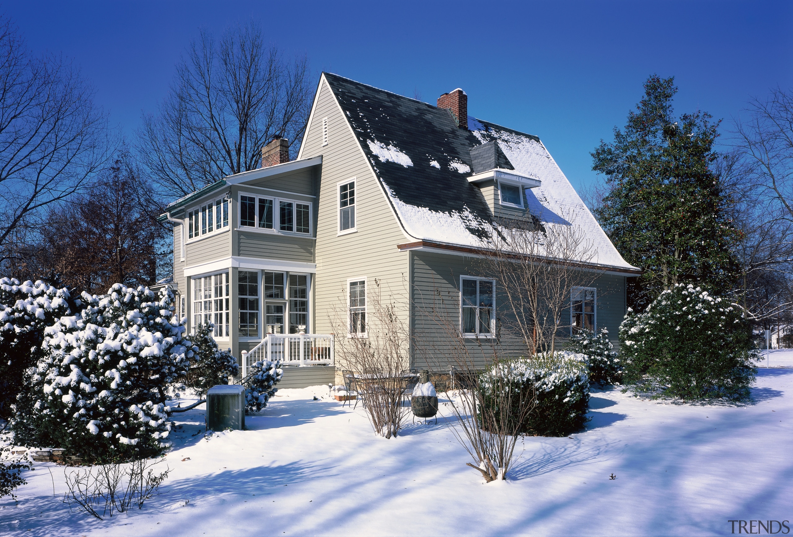 Maintaining the historic aspect of this home was building, cottage, estate, facade, farmhouse, freezing, home, house, log cabin, neighbourhood, property, real estate, residential area, roof, siding, sky, snow, suburb, tree, window, winter, blue