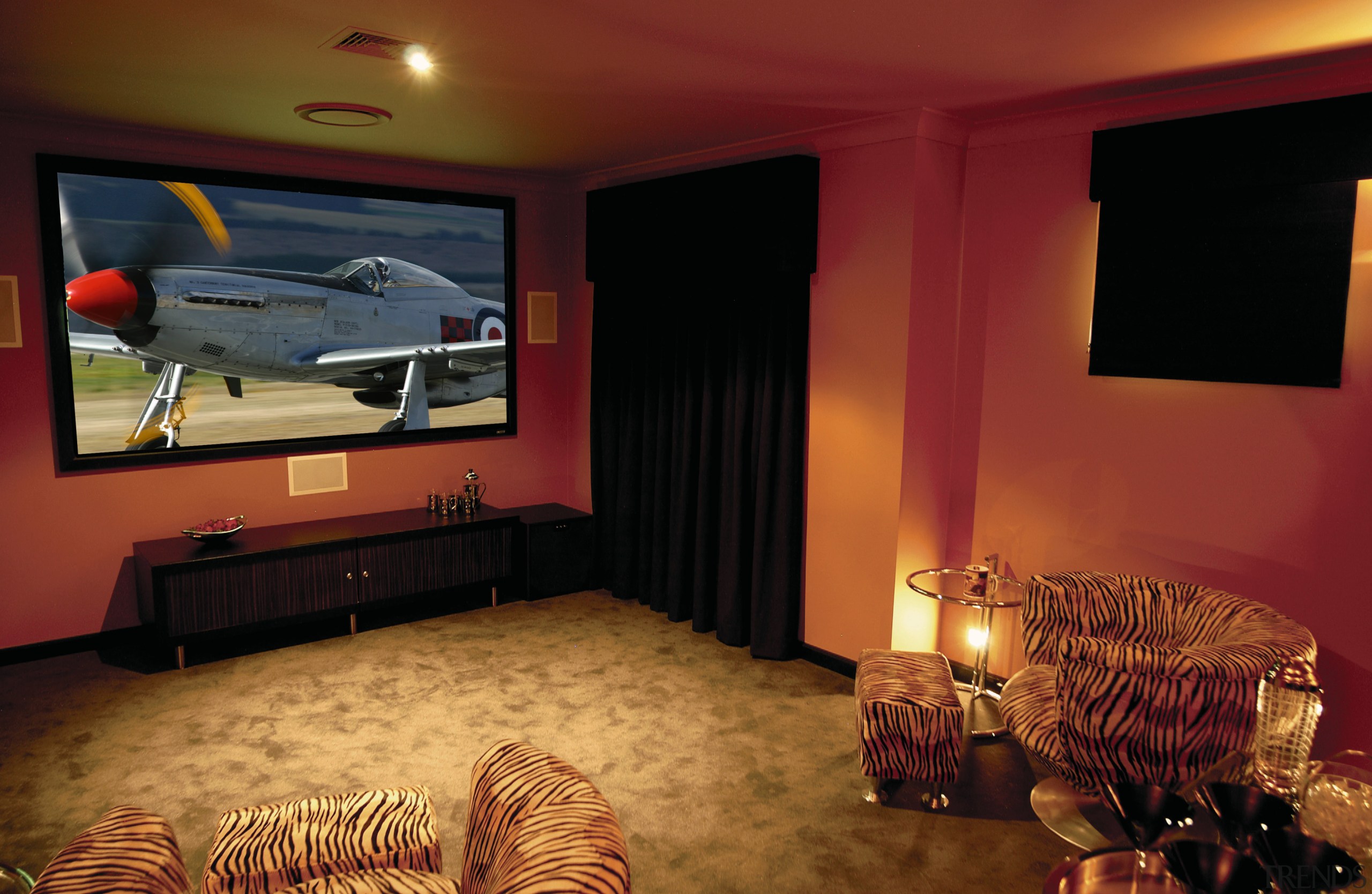 A view of a home theatre, patchy brown ceiling, entertainment, home, interior design, lighting, room, wall, red
