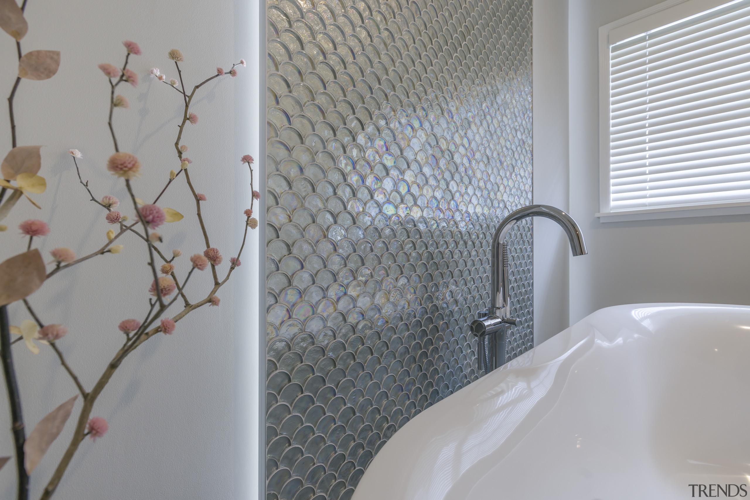 This feature 'Silver Scale' tile wall is further architecture, bathroom, bathroom accessory, curtain, floor, flooring, home, house, interior design, plumbing fixture, property, real estate, room, shower curtain, tap, tile, wall, window treatment, gray