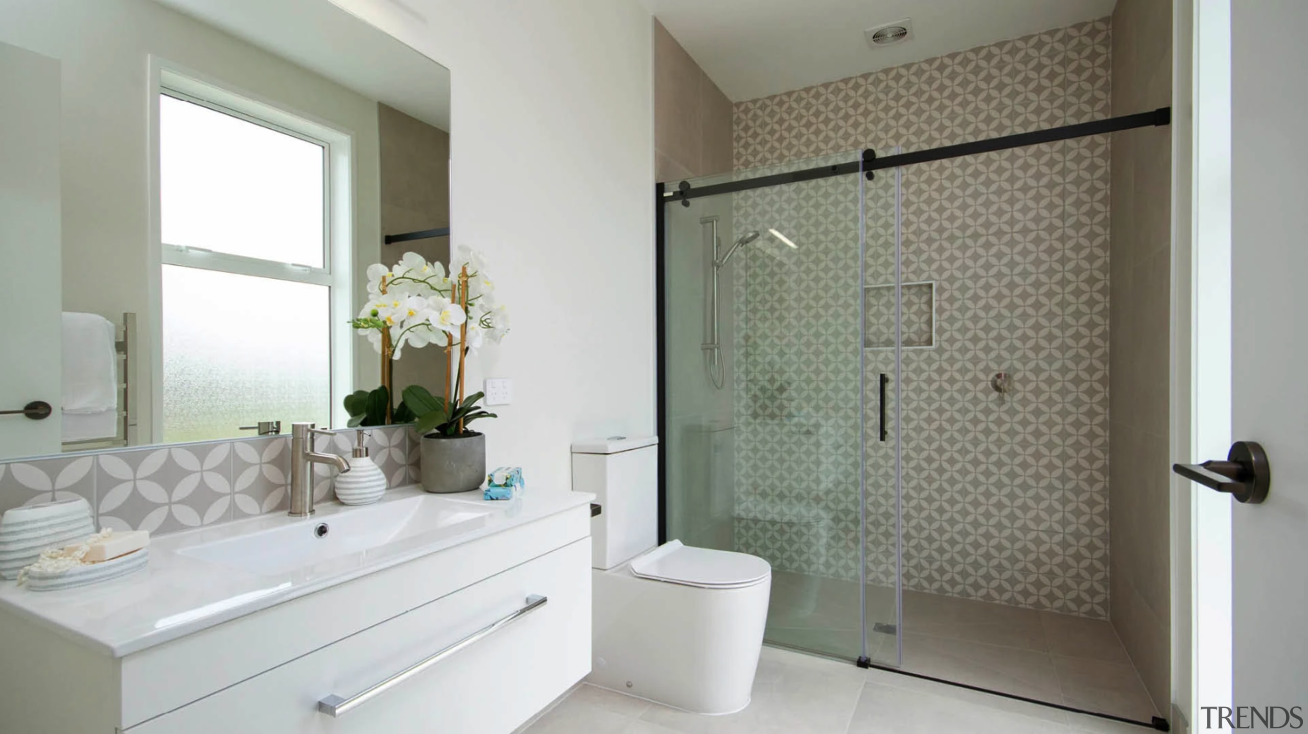 The ground floor bathroom complete with designer tiles 