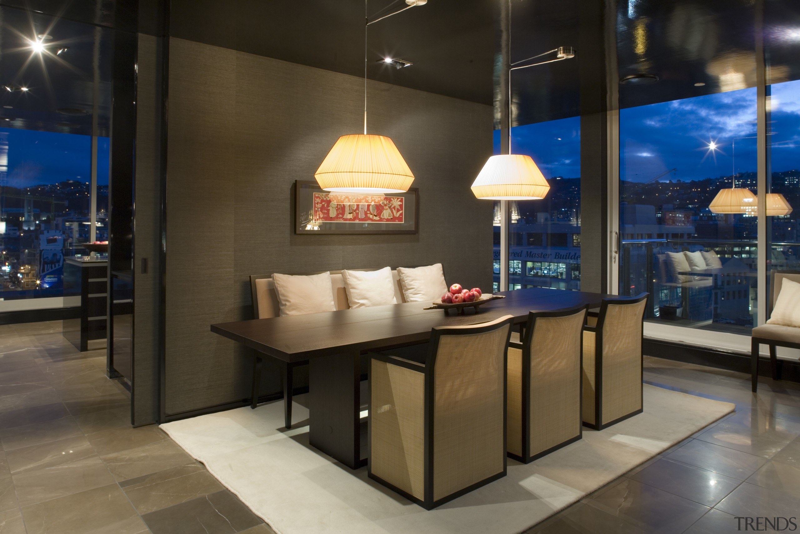 A view of the stairs featuring glass ballustradng, interior design, table, black