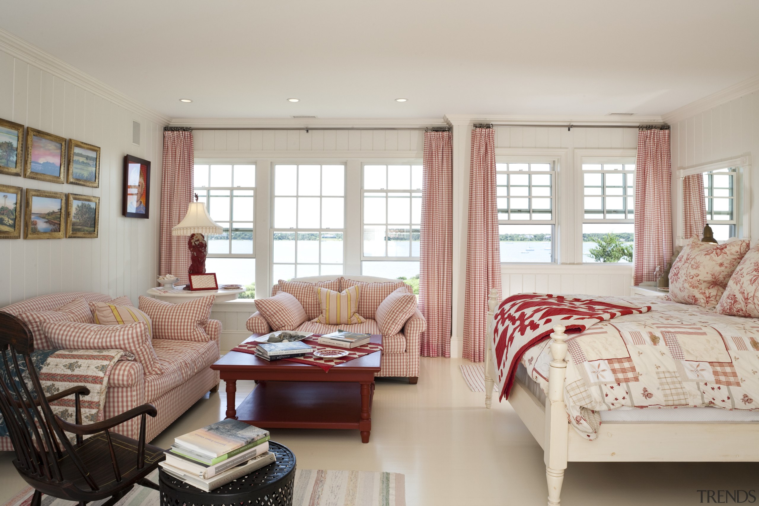 The red and white theme in this bedroom bedroom, ceiling, floor, furniture, home, interior design, living room, real estate, room, window, window covering, window treatment, gray