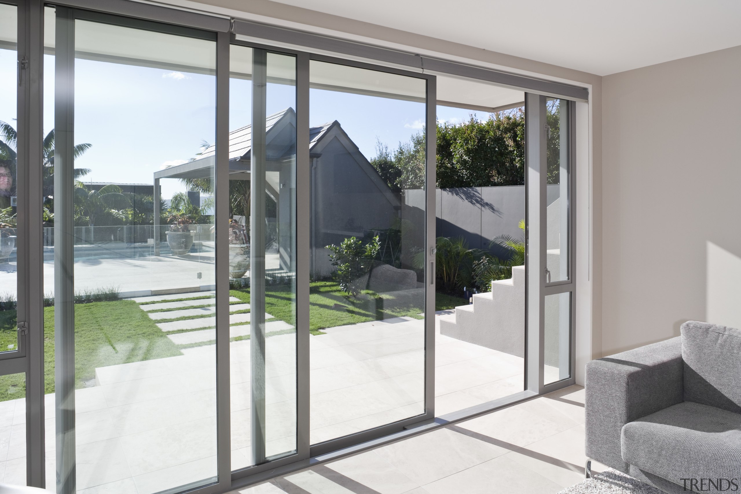 View of a house which features aluminium joinery architecture, daylighting, door, glass, handrail, house, real estate, window, gray, white