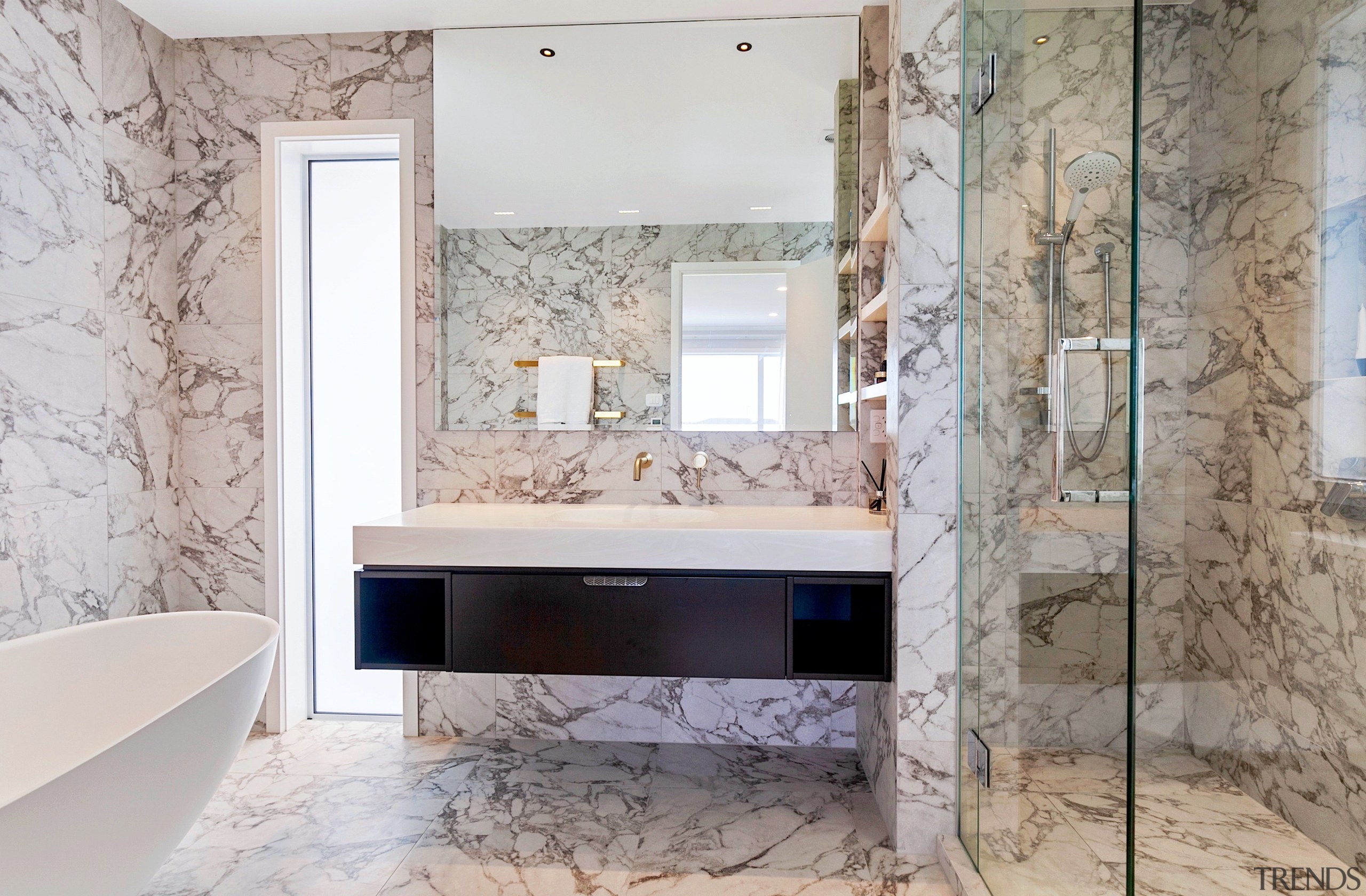 The floor and walls of this ensuite are 