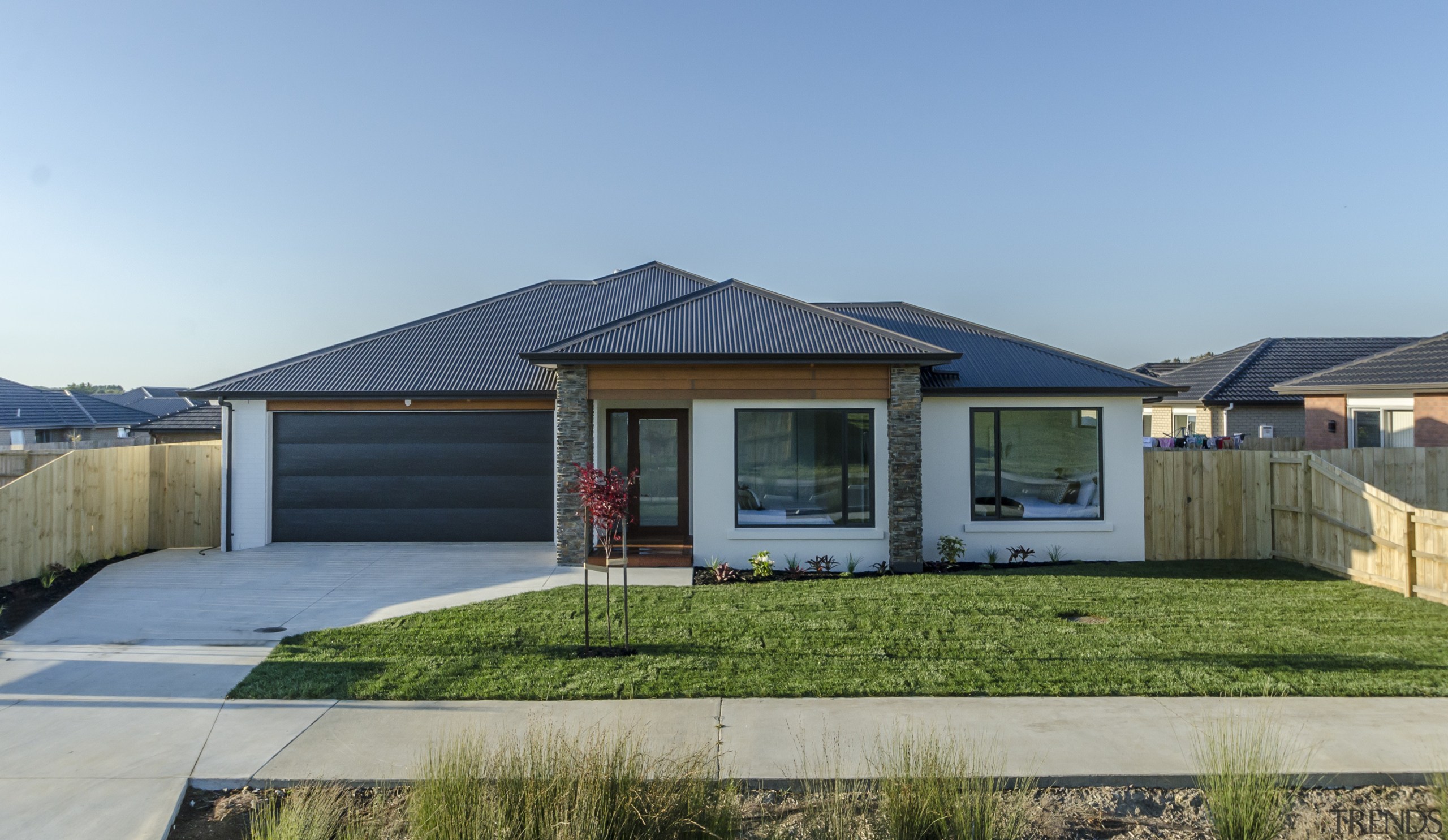 This Sentinel Homes showhome in Twin Parks, Papakura cottage, elevation, estate, facade, home, house, property, real estate, residential area, gray, teal