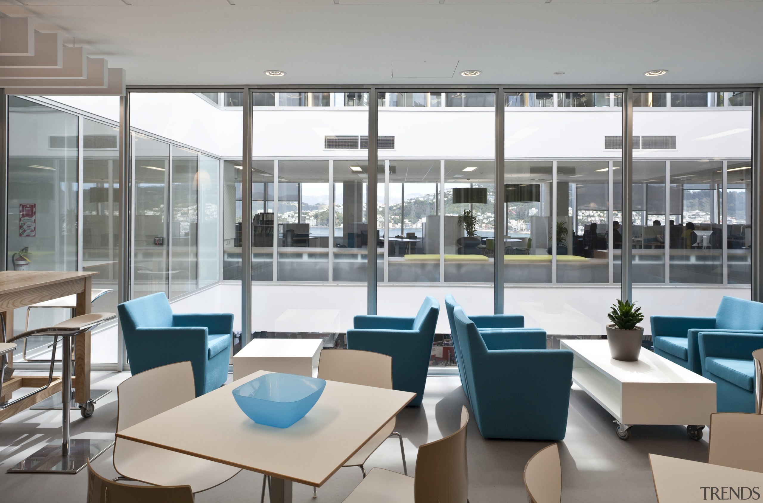 View of the Aserton Centre with glass roofed daylighting, furniture, interior design, office, table, gray