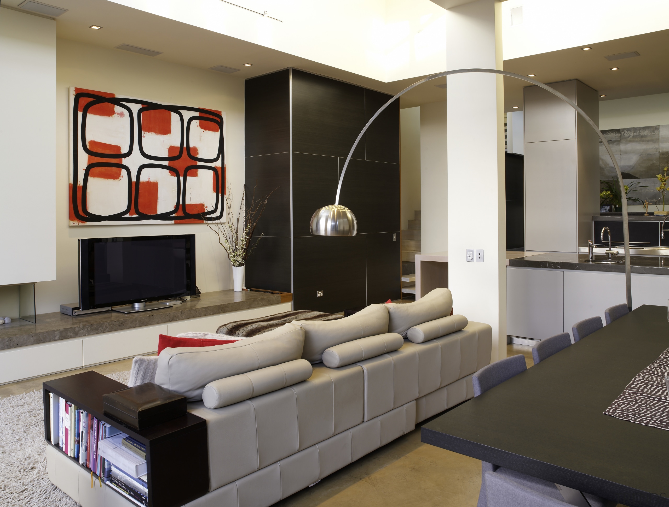 The angular motif is softened by the delicate furniture, interior design, living room, room, white, black