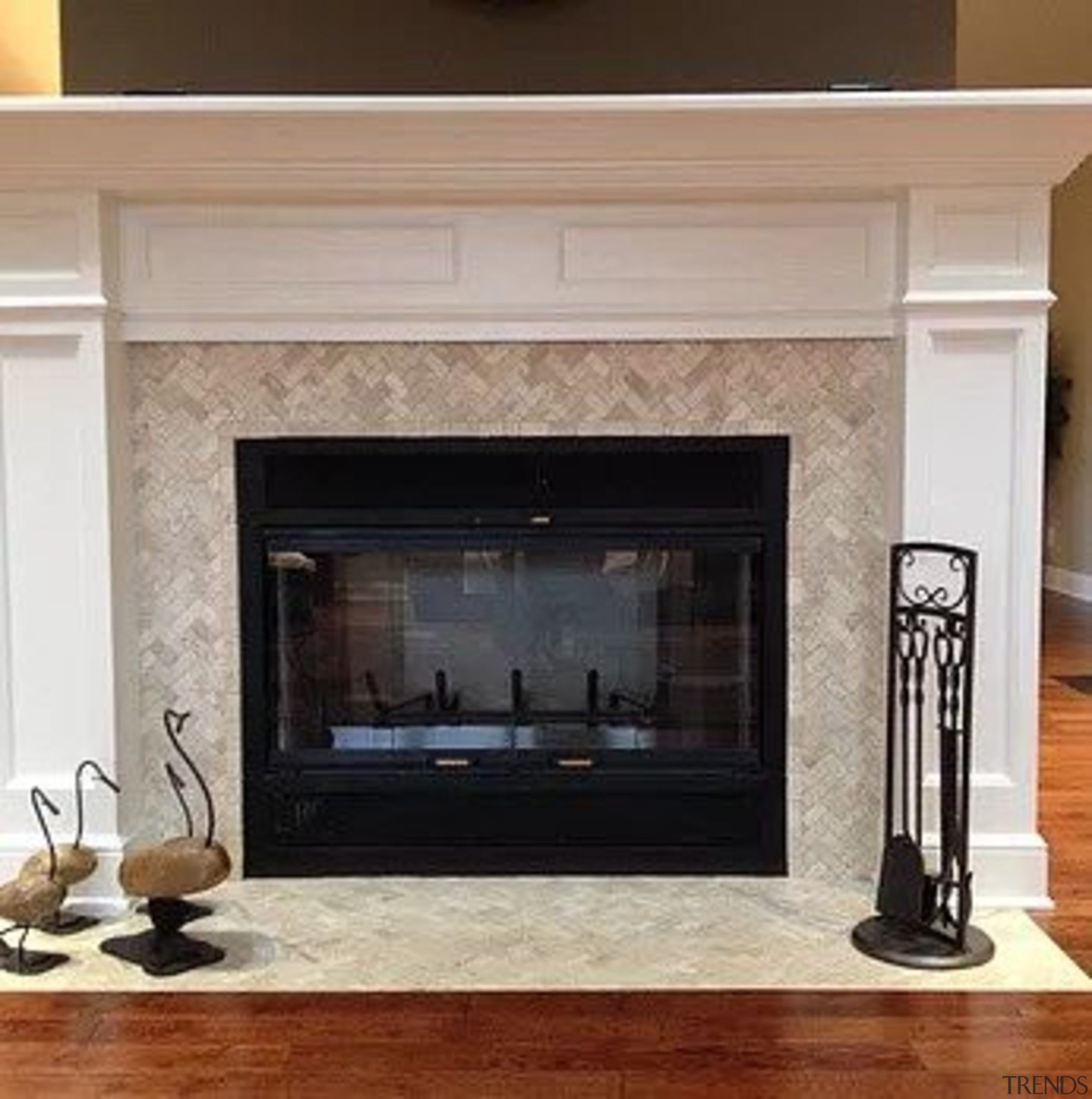 For more information, please visit Casa Italiana fireplace, floor, flooring, hardwood, hearth, wood burning stove, gray
