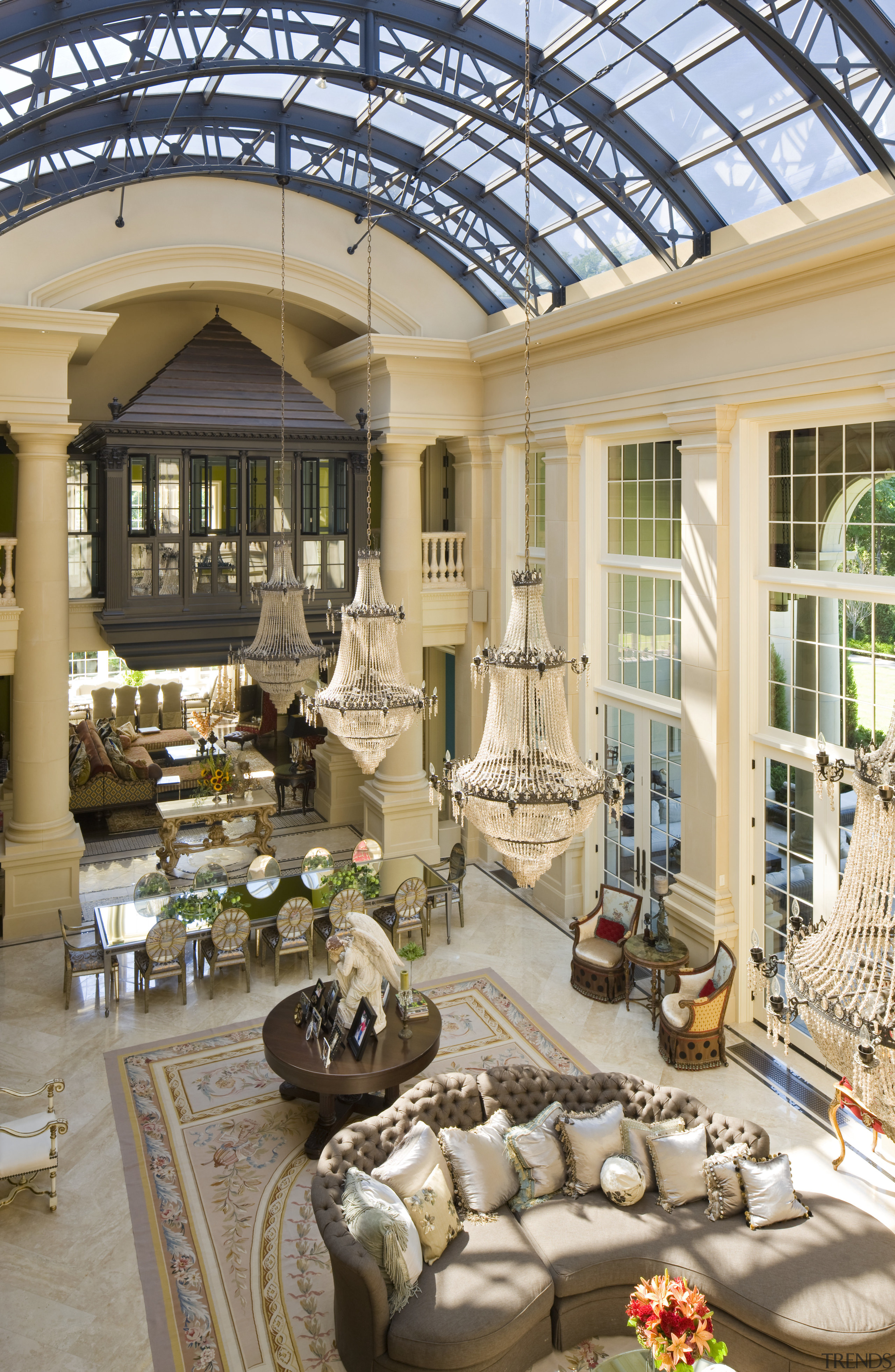 Natural light floods this grand salon from a home, interior design, living room, lobby, outdoor structure, window, gray, brown