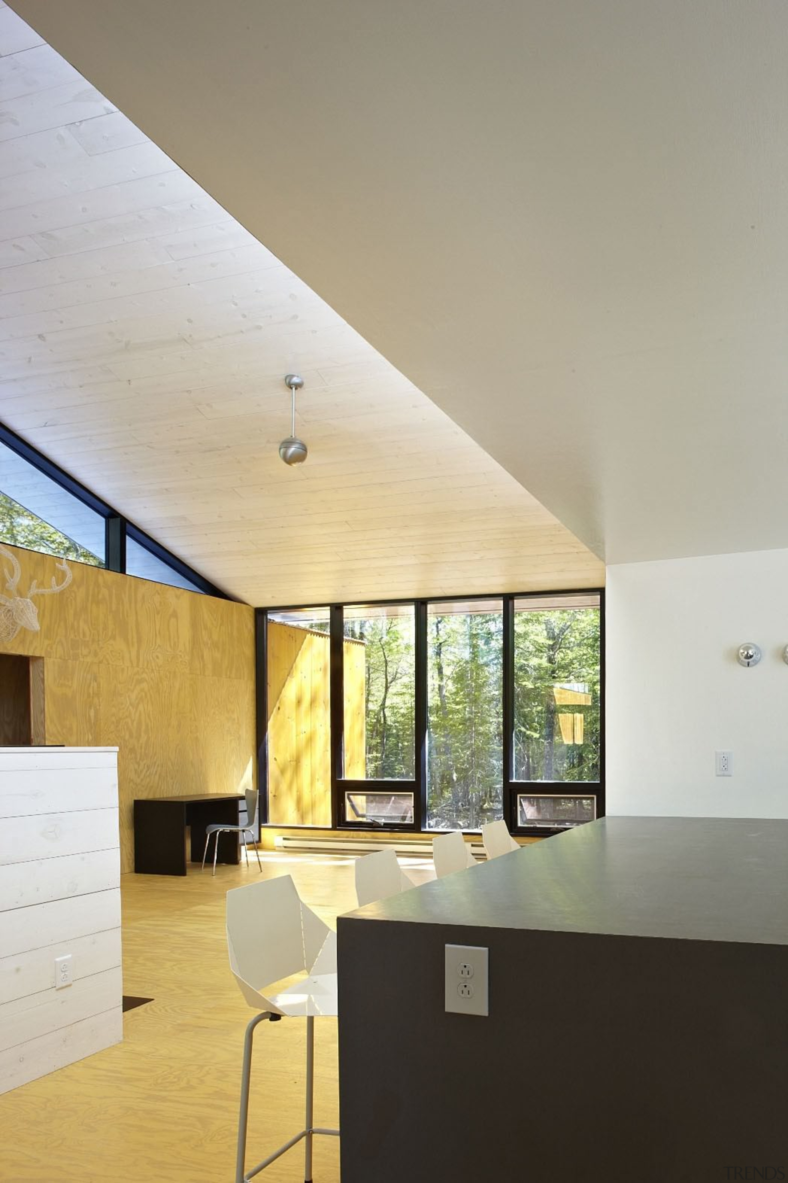 The high ceilings are church-like and flood the architecture, ceiling, daylighting, floor, home, house, interior design, real estate, roof, wall, window, gray