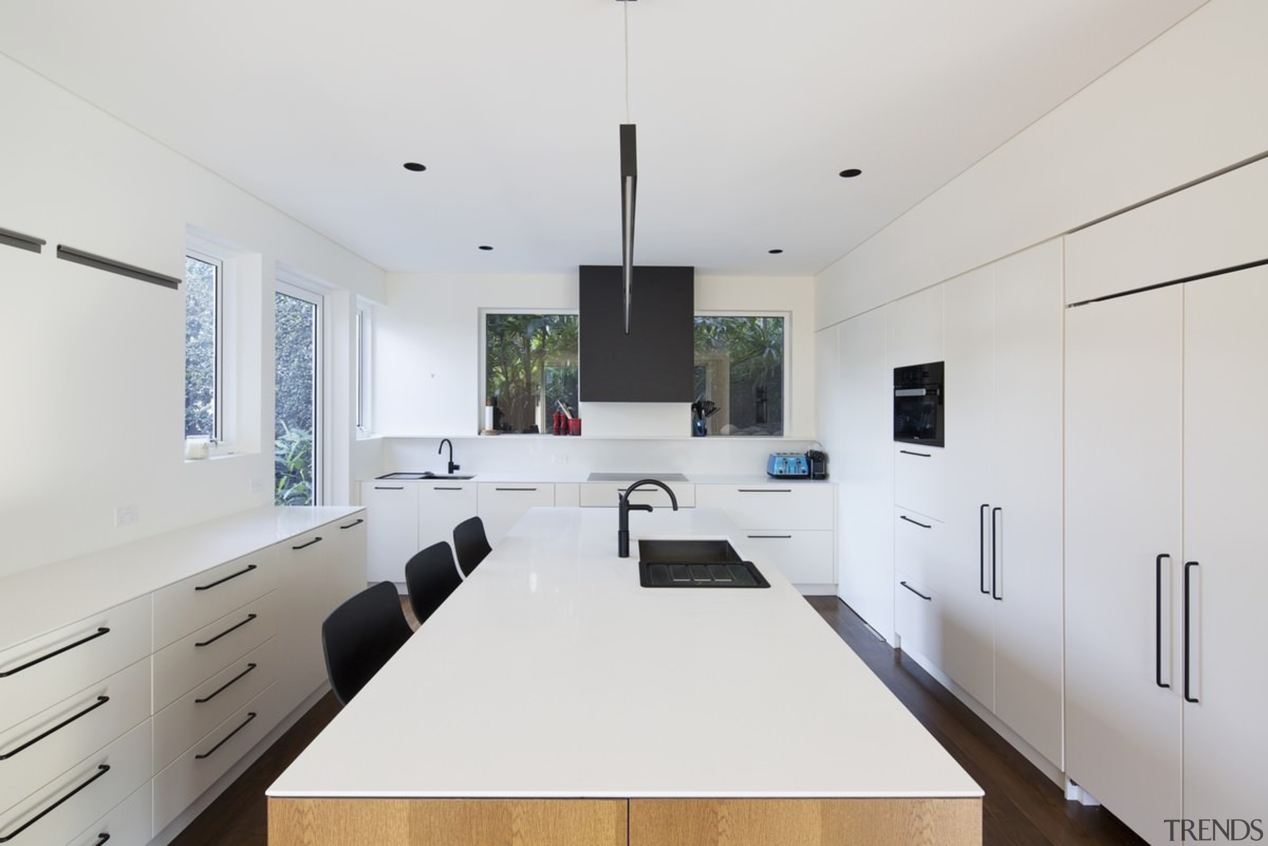 Bar seating within the kitchen itself means the architecture, countertop, house, interior design, kitchen, product design, real estate, room, white