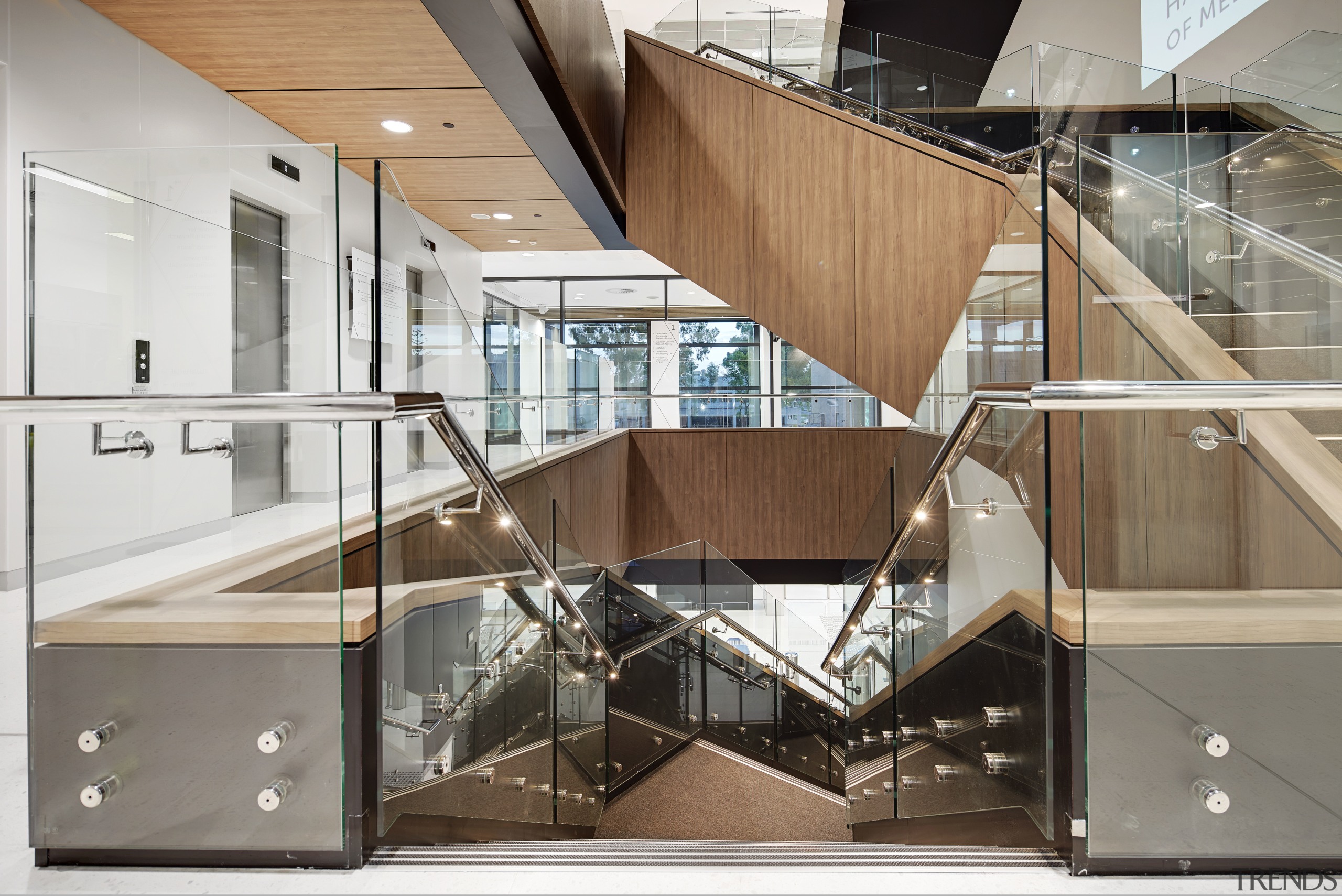 A dramatic sculptural staircase links all the floors architecture, glass, handrail, stairs, white