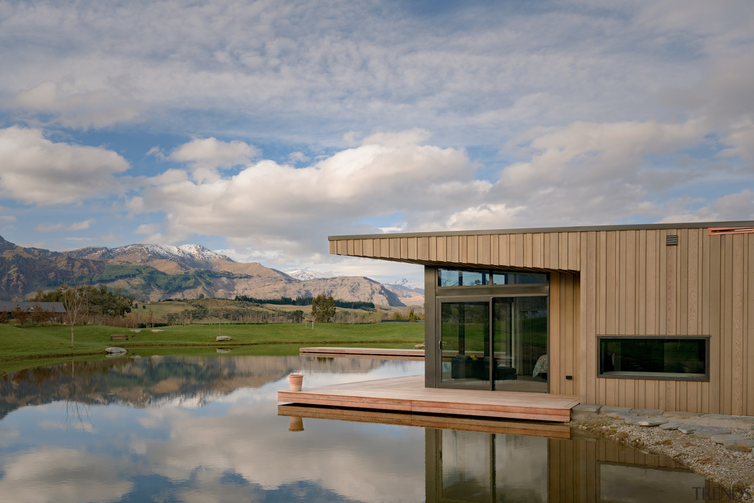 Cedar cladding works well with the verdant natural 