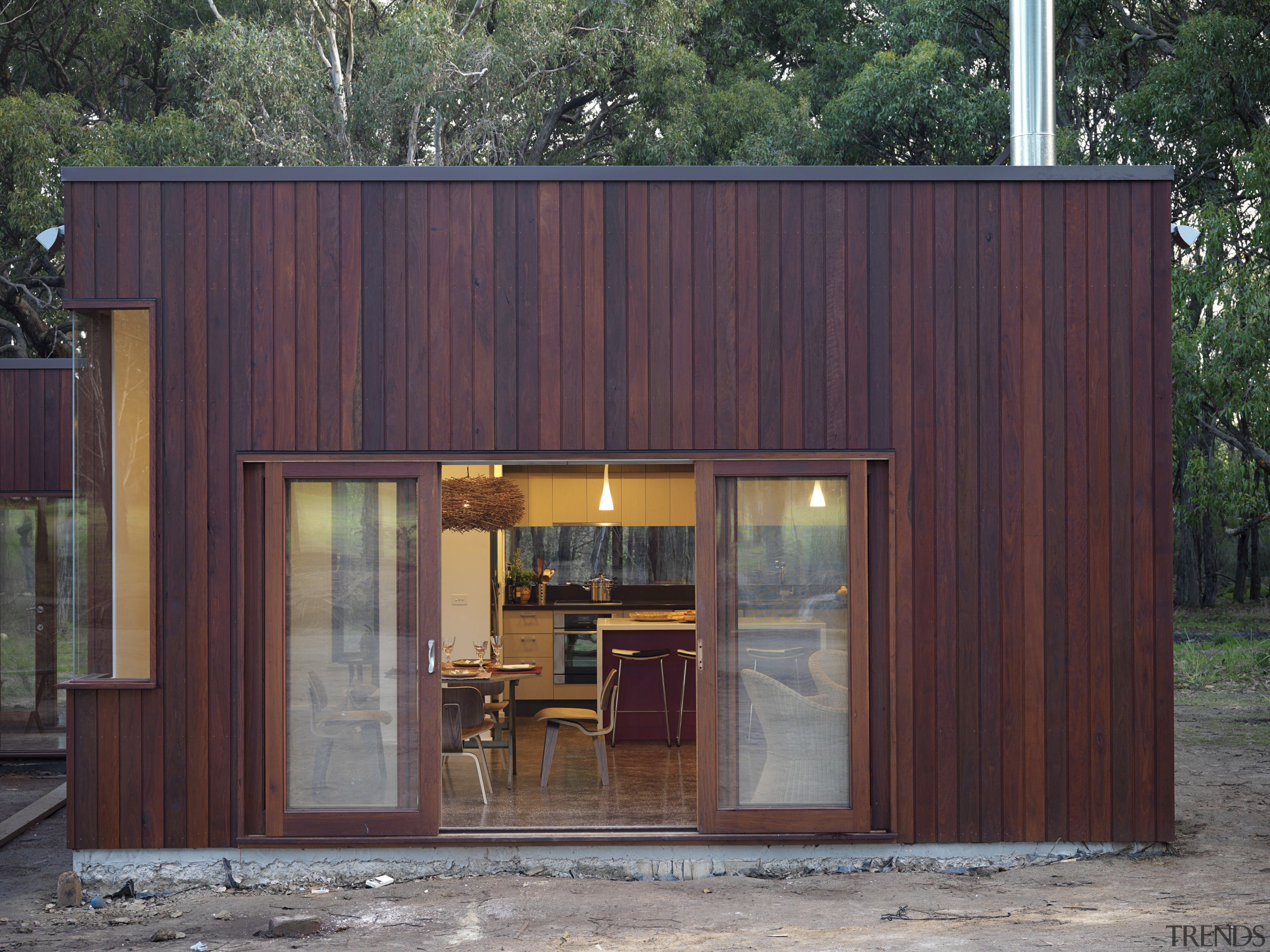 This extension, set on a 20ha rural property, architecture, facade, house, shed, siding, wood, wood stain, red